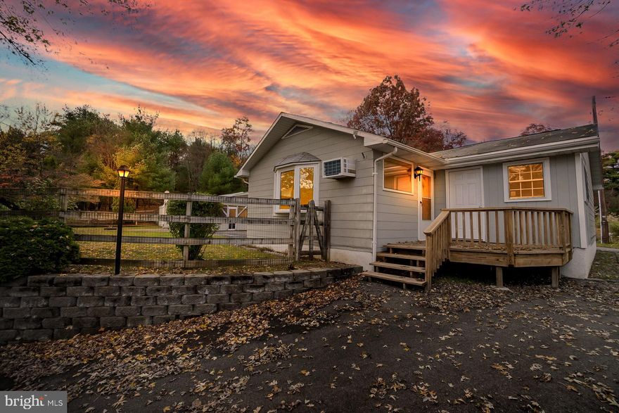 Discover your dream ranch home in the highly sought-after Palmerton School District. Property boasts a large 3-car detached garage with a convenient screened porch, providing ample space for your vehicles and more. The expansive paved driveway ensures easy guest parking, making entertaining a breeze. Step outside to the inviting front deck and spacious fenced-in yard, offering a private haven for outdoor activities and taking in the stunning mountain views. Inside, an open floor plan connects the large living room with a bay window, a formal dining room, and a kitchen with a center island. A mudroom with rear access adds convenience to daily living. The master bedroom suite features a private bathroom, an attached office space, and access to the front deck. The partially finished basement is an entertainer's delight, complete with a full-size bar, open space, and a large laundry/utility room. Home Warranty included in sale! Don't wait! Call today!