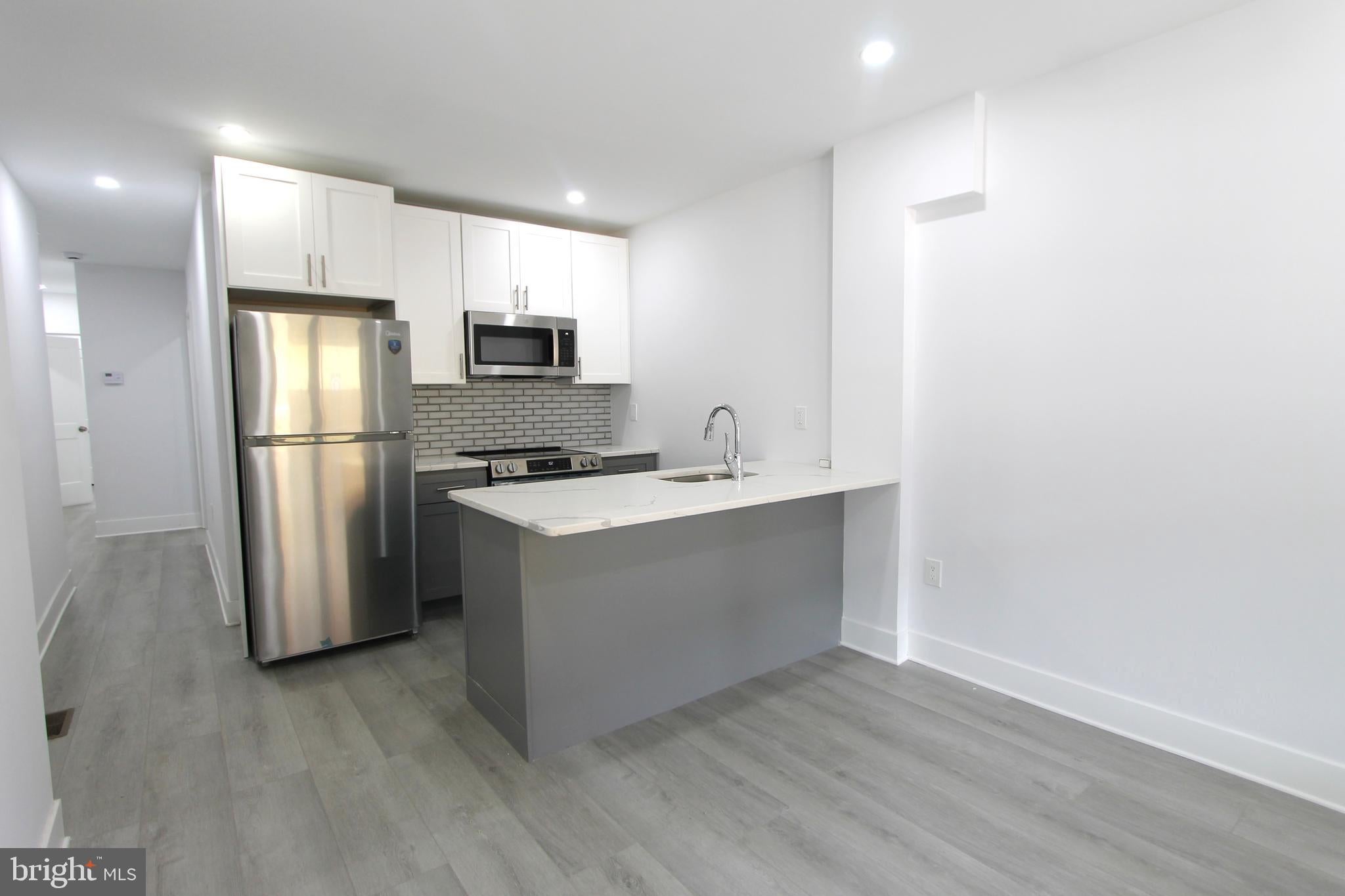 103 E COULTER STREET 1ST FLOOR