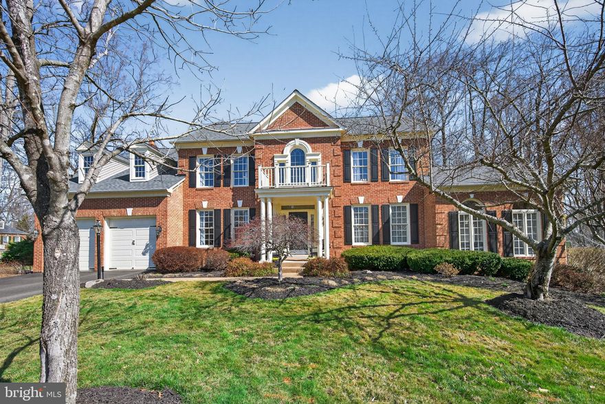 Elegant estate living awaits in this beautifully updated 5 bedroom, 4.5 bath Colonial with a two car garage, where thoughtful updates and attention to detail are evident throughout. This rarely available Potomac III model features an exceptional floor plan designed for both comfortable everyday living and effortless entertaining. An inviting front porch leads into a light filled two story foyer with refinished hardwood floors and fresh interior and exterior paint, creating a truly move in ready home.

The main level includes formal living and dining rooms, a private office with custom built ins, and a spacious family room with gas fireplace and double French doors opening to the deck, creating a warm, inviting space ideal for indoor and outdoor entertaining. The expansive vaulted sunroom is a standout feature, offering a bright and comfortable gathering space filled with natural light.

The updated kitchen is open to the family room and includes granite countertops, Carrara Marble backsplash, center island, double wall ovens, gas cooktop, and a butler’s pantry with wine fridge. The adjacent eat in kitchen area provides a welcoming space for casual meals and everyday living with direct access to the deck overlooking lush landscaping and wooded views.

Upstairs, the spacious primary suite offers a private retreat with cathedral ceiling, sitting area, walk in closet, and spa like bath with soaking tub, double sinks, and separate walk in shower. Two additional bedrooms share a Jack and Jill bath with double vanity, while a fourth bedroom features its own en suite bath.

The walk out lower level provides exceptional flexibility with a large recreation space and game area with pool table, offering plenty of room to spread out. A fifth light filled bedroom includes a cedar walk in closet. The lower level also includes a full bath, laundry room, gym flex space, and expansive storage. French doors lead to an inviting patio with built in BBQ, extending the home’s living spaces outdoors.

Just steps away, residents enjoy a beautiful parklike setting with open field, walking and jogging trails, and half court basketball. Trails connect to South Run Recreation Center, Burke Lake Park, and Lake Mercer. Commuters will appreciate the Burke VRE station less than five miles away, along with convenient access to Fairfax County Parkway, I-495, I-66, I-95/395, the Springfield Metro, Fort Belvoir, The Pentagon, and Quantico.

Located in the highly sought after Sangster Elementary and Lake Braddock Secondary School pyramid, offering the ideal combination of comfort, space, and convenience.

Welcome Home!