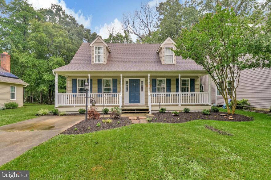 Back on the Market with Special Improvements Coming Soon! Hampshire - Rarely seen on the market in this area, this cape-cod style home has a trademark large front porch! Inside is a great floorplan with a main level bedroom and full bathroom, living area, dining area and open kitchen with granite counters, stainless steel appliances and white cabinetry. The upper level has 2 larger bedrooms, one with entry to the large full bathroom that also has dual entry from the hallway for shared access. There's a good size back yard and front yard with mature trees. The pinnacle is a neighborhood lake with a walking trail, multiple playgrounds, tennis courts, and a swimming pool. Seller is having the crawlspace professionally cleaned and improved!  Easy access to DC, Northern VA, and Annapolis! Lastly, the home is super close to the mall, an elementary and high school, grocery stores, Target, plenty of nail salons and spas, gyms, etc. Affordable and Convenient!