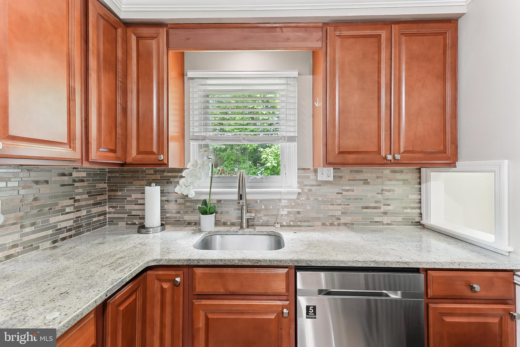 AVAILABLE IMMEDIATELY! Beautiful townhome nestled in the desirable Woodmont North community in Downingtown, PA, offering a blend of modern upgrades and timeless charm. With award-winning Downingtown schools and the prestigious STEM Academy nearby, this property is a perfect choice for families and professionals alike. As you walk in the front door you will notice the crown molding that graces the living spaces, and a cozy family room featuring a see-through wood-burning fireplace connecting to the elegant dining room. The upgraded kitchen boasts stylish countertops, tile backsplash, ample storage, and a refrigerator is included for your convenience. Additionally, there is a flex room perfect for a home office or second living room. A powder room and pantry complete the first level. The Spacious Second Floor offers a large primary bedroom with a walk-in closet and a newly updated primary bath. Two additional bedrooms, including one with a generous walk-in closet, provide versatility for family, guests, or home office needs. The updated hall bath adds modern flair. The full basement offers excellent potential for additional living space, a home gym, or abundant storage. This home has recently been enhanced with an updated kitchen and bathrooms, new windows, sliding glass door, a brand-new roof, a high-efficiency heat pump, and a new hot water heater for peace of mind and energy efficiency. This home is situated in a prime location and combines the best of comfort, convenience, and community living. Enjoy easy access to local parks, dining, shopping, and major commuting routes. ASK ABOUT INTEREST RATE BUY DOWN...Don’t miss this opportunity—schedule your showing today and make this Woodmont North gem your new home! Home is being sold in as is condition and is ready for immediate occupancy. HOA note: Dog are not permitted unless a registered service or emotional support dog. *Call Mike Quinn for more information.
