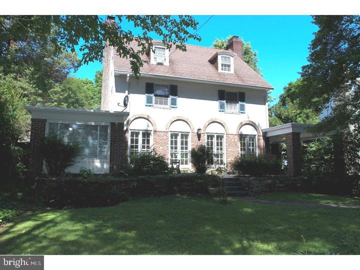 Absolutely spectacular & stunning French colonial 5 bedroom 3 bath plus a powder room, a true Lower Merion Gem. The private driveway leads you to this stately 5 bedroom 3 1/2 bath private retreat. This classic Colonial has everything you are looking for,space,privacy & convenience. A kitchen with granite counter top includes top of the line Whirlpool appliances, a Terra Cotta floor, a true Cooks kitchen, a Chefs dream that includes an eating area. This leads to a sunny large Formal Dining room complete with a working Fireplace to make those winter mornings and summer nights a welcoming entertaining area. The Dining Room opens to a covered porch for your outdoor enjoyment. The large front to back Living Room has a wood burning fireplace and great natural light streaming in from a huge picture window that opens to an all season Sun room, perfect for cozying up to a good book. The Living Room and Dining Room have hardwood flooring. All bedrooms are spaciously proportioned located on the top two floors. The second floor has three or four bedrooms with Jack and Jill bathrooms connecting the bedrooms, the fourth Bedroom may be used also as an office or an over sized closet. What a bonus that this room contains full Washer and Dryer hook ups to make this a home with laundry on the upper floor, along with full sized Washer and Dryer located in the basement. The third floor is finished to include two additional over sized bedrooms with another full bathroom. The back yard and patio are the perfect setting to relax and enjoy the perennial gardens. A large detatched two car garage . The mud room is accessible in the landing of the large unfinished basement with its own outside entrance. This home is a must see.