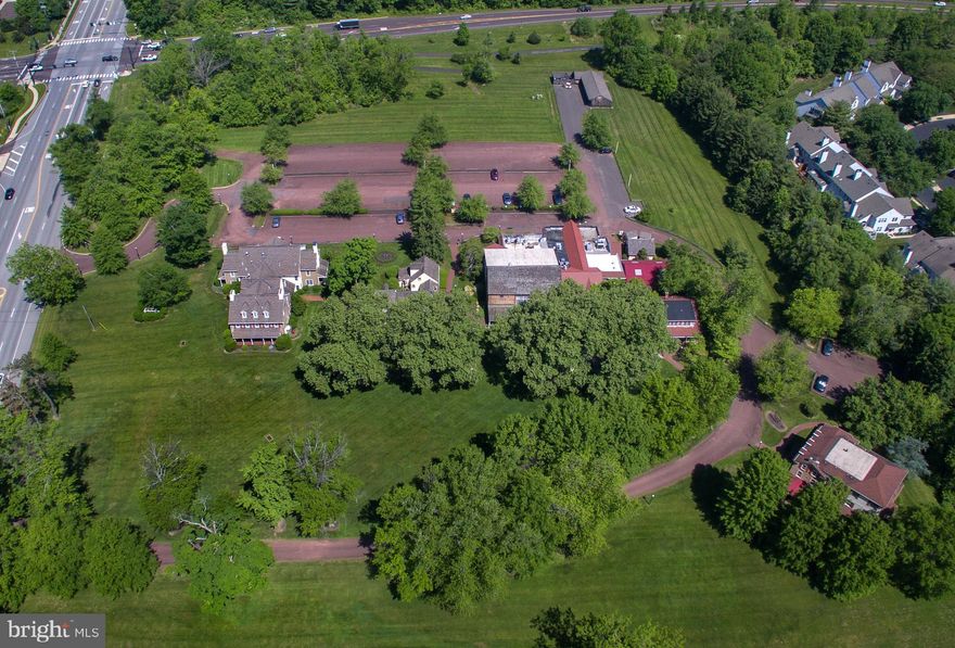 The Joseph Ambler Inn, available for the first time in over 40 years of business.  Brimming with pride in ownership and quality guest experiences, this sprawling 12+ acre complex features 5 primary buildings (a mix of modern construction and historic/antique stone farmhouses and barns) which form a combination 52 room hotel, full restaurant w/ liquor license and bar/tavern with indoor and outdoor seating in excess of 200 seats, and a large banquet hall divisible into two separate event rooms plus an outdoor ceremony pavilion.  Nearly 40,000 gross SF of buildings, multiple streams of revenue (including special events, weddings, corporate meetings, etc), plenty of parking and located on the scenic US 202 parkway at a signalized intersection close to major roads to and from the greater Philadelphia area (309, I-476, the PA Turnpike) and major corporate offices/population centers, this "once in a generation" opportunity to take the reigns of a thriving and unique property only comes along once or twice a century.