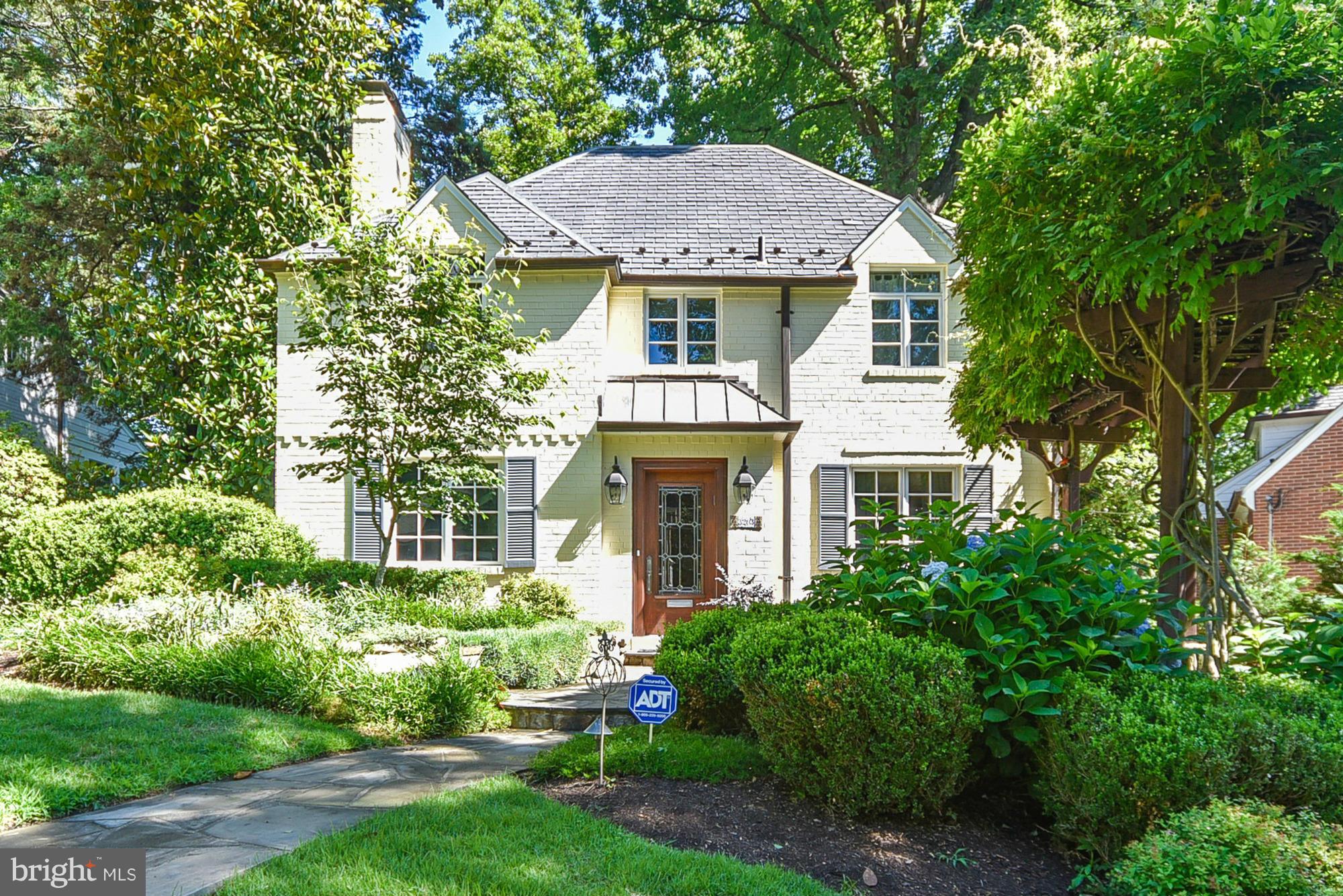 Huge price adjustment! Staged and looking like a model home! Great scale & space. Behind unassuming facade, 4 levels of perfection. SS Cook's kit w sep breakfast room. Family rm w stone fp. Huge DR, screen porch, sumptuous MBR & BA. 3rd level hideaway (br #5). Delightful rec rm. beautiful landscaped private lot.