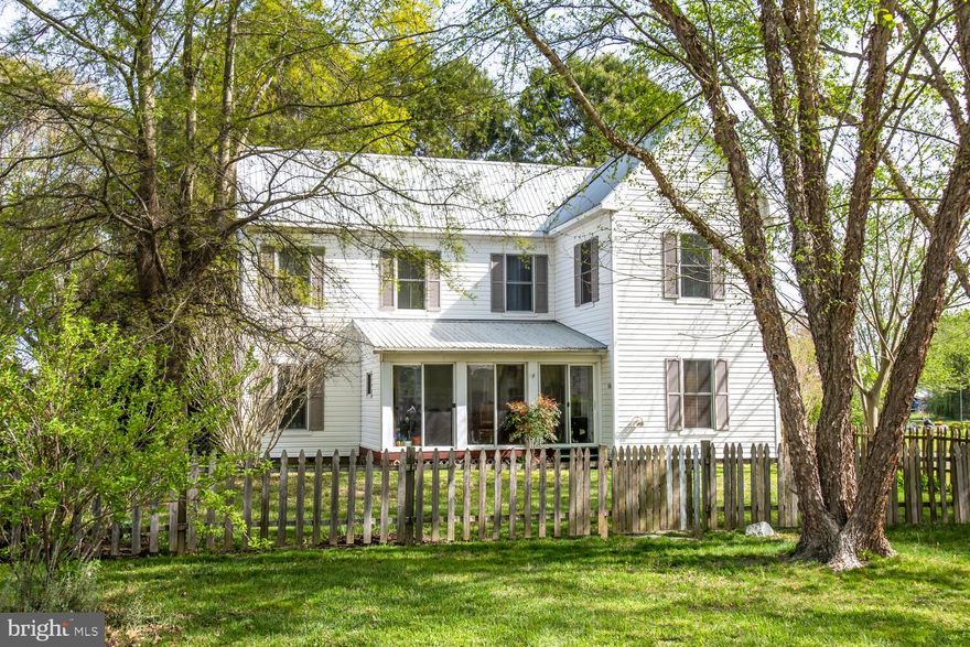 Tucked away and off the main road in the Village of Royal Oak. Sun filled farmhouse with three bedrooms and two + baths on a nicely landscaped lush lot.  Downstairs rooms open to three season sunroom and upstairs you will find three bedrooms and two full baths with convenient upstairs laundry room.  Fabulous large kitchen pantry with built in shelving adjoins kitchen.  Sunroom faces south and has three sets of sliders to fenced yard. Specimen mature trees offer privacy and shade, vintage  storage shed and plenty of room for a garden or extended lawn, The property is served by the county sewer service (quarterly billing) and has a private well. Be sure to see recent survey in documents for property boundary.