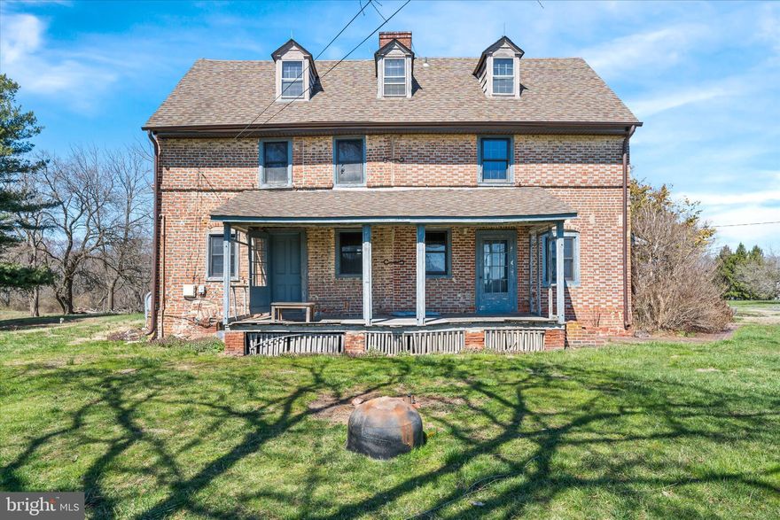 Step into the past and own a piece of Delaware's history with the Dilworth House, one of the earliest homes built in the state by Olla Jansen, a Swedish colonist from the 1600-1700 Native American Period. Situated on 12.25 acres of pristine land that backs up to the Augustine Wildlife Preserve, this property is a rare find, offering both a home and a rich connection to the past. The Dilworth House is a true gem, showcasing some of the finest early masonry craftsmanship in Delaware. The distinctive "diapering" pattern, glazed brick in diagonal lines, adorns the gable ends, while stepped belt courses and intricate framework add to its historic charm. Inside, you'll find beautifully exposed beams and brick fireplaces, which once served as the heart of the home’s heating system, with the house originally built in two sections and warmed by a single chimney.
This three-story home offers 6 bedrooms, 3 full bathrooms, and 2 half bathrooms, with a fully finished attic on the third floor providing additional living space. The partial basement remains unfinished. Updates over the years have enhanced the home’s functionality, while carefully preserving its historic features. Most of the home remains in it's original state which will require work. For those with a passion for farming, mechanics, or automobiles, this property offers everything you could need. A silo, milk house, dairy barn, cow shed, and storage shed are all included, with the barn having been converted into a workshop—though it could be easily repurposed for a variety of uses. The expansive grounds also offer the possibility of subdivision, providing ample opportunity for future development. This is a once-in-a-lifetime chance to own a truly historic property in a prime location. Don't miss out, schedule your tour today!