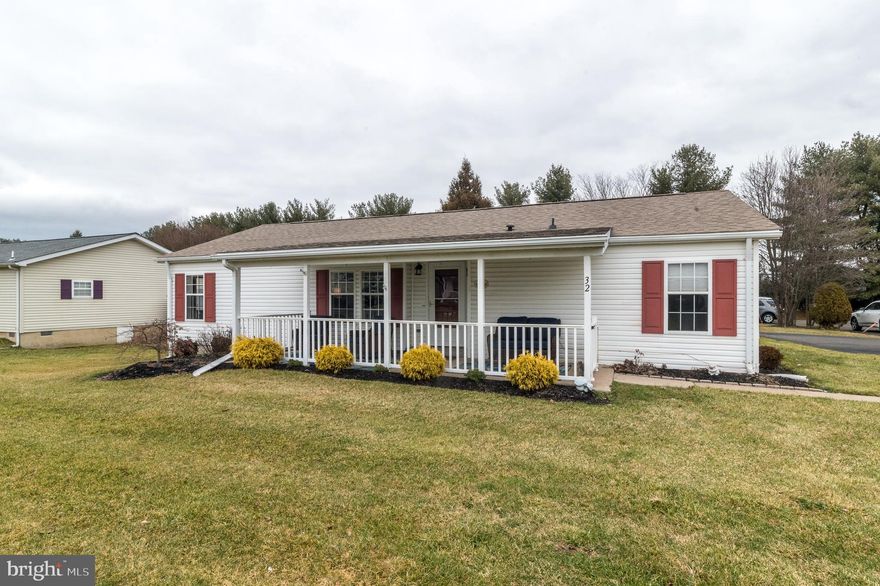 Welcome Home to 32 Willow Ct. This well-maintained corner property in Buckingham Springs Active Adult Community has so much to offer.  Lots of light, neutral paint and carpeting provide a move-in ready home. Two nice size bedrooms and ample closets. The primary Bedroom has a full Bath with walk-in shower, vanity and linen closet. The Living Room flows into the formal Dining Room , charming Kitchen and a sunlit cheerful Family Room.  You have another full Bath off of a second Bedroom which can also be used as a Study or Den. The Laundry Room off of the Kitchen has a full size washer and dryer and utility sink. Enjoy the inviting front porch while you relax and have your morning  coffee. There is a good-sized shed for extra storage and 2 parking spaces. The included community ammenities include a lovely Clubhouse, Outdoor Pool, Billards Room, Library, Gym, lots of Hobbies and Activities to join, Transportation and more. Just unpack and enjoy senior living at its best!!