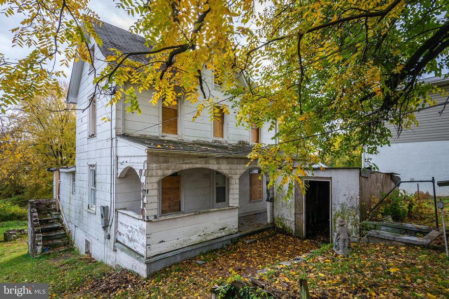 LOOKING FOR YOUR NEXT RENOVATION PROJECT?  Well look no further!  Large detached home in the Morrell Park neighborhood on a large .41 acre lot!  This property features 3 bedrooms and 1 full bath and is need of a full renovation but has tons of potential.  Nearby park has tot lots, tennis & basketball courts and property is convenient to I-95.  Sold As-Is!