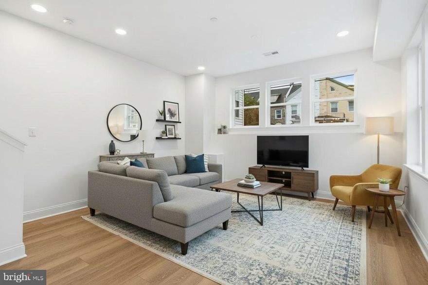 Incredible new construction 3-bedroom, 2.5 bathroom home on a prime corner lot in the desirable Overbrook/Wynnefield neighborhood, just steps from City Line Avenue! This stunning 3-story residence offers a spacious, open-concept first level ideal for entertaining, flooded with natural light. The modern kitchen features quartz countertops, a designer backsplash, and a brand-new stainless steel appliance suite. Upstairs, the primary ensuite showcases vaulted ceilings and a bright, airy atmosphere. With thoughtful upgrades throughout, expansive living space across three levels, and easy access to major routes, shopping, and public transportation, this home is a standout opportunity.

*Some photos have been edited and staged by AI