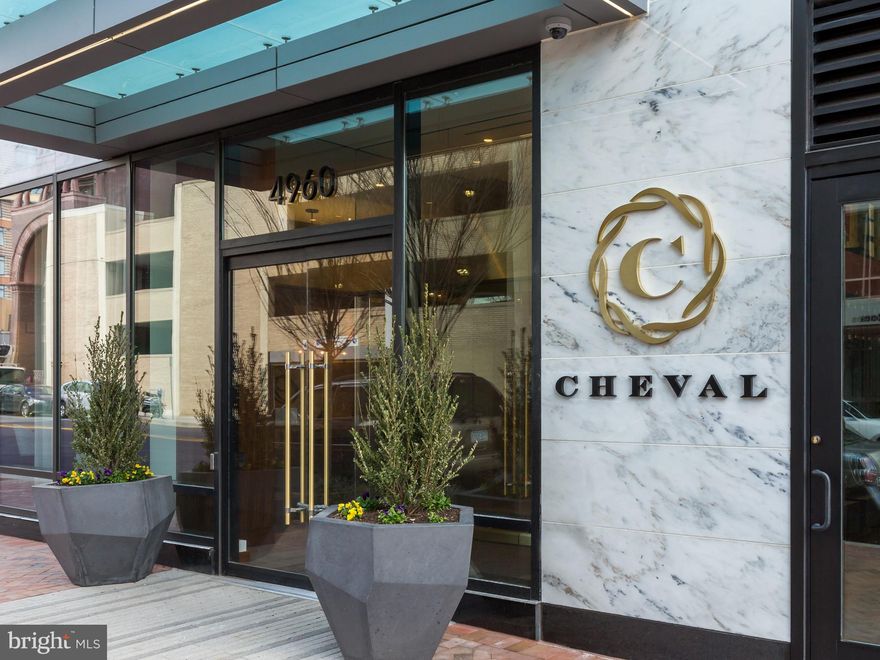 Sensational 3 bedroom, 2.5 bath , 2,080 sq. ft luxury condo at Cheval on the 14th floor with breathtaking, panoramic and vista views!! Open foyer entry opens to the combination living and dining room with access to a balcony. Gourmet kitchen with custom white cabinetry An island/breakfast bar with double drawer refrigerator, and Bosch appliances (gas cooktop & under counter oven, dishwasher, counter depth refrigerator w/french doors, bottom freezer & ice maker, combination wall oven & microwave) complete the kitchen. Off of the foyer is a coat closet, a formal powder room, laundry room with washer/dryer. The grand primary bedroom suite has two walk-in closets (with custom closet ), and a knockout primary bath (encompassing separate shower, double vanity/sinks, free standing soaking tub, ceramic tile flooring,
 Floor-to-ceiling walls of glass windows, 9' ceilings, and gorgeous oak hardwood flooring throughout. A 2-zone forced air HVAC system. Above ground parking garage with 2 parking spaces and separate storage units. Enjoy the Cheval amenities: 24/7 concierge, beautifully appointed lobby that adjoins the oversized club room/residents lounge (with gas fireplace, comfortable seating areas, table/chairs & wall television), a fitness center/gym , yoga studio, and an expansive rooftop terrace (encompassing multiple seating & dining areas, outdoor kitchen area w/grilling station) that provide outstanding views! The Cheval of Bethesda features 17 floors, 71 modern condominium residences and on-site management. Only steps away to the Bethesda Metro station, shops, boutiques, restaurants, grocery stores and all that downtown Bethesda has to offer!
