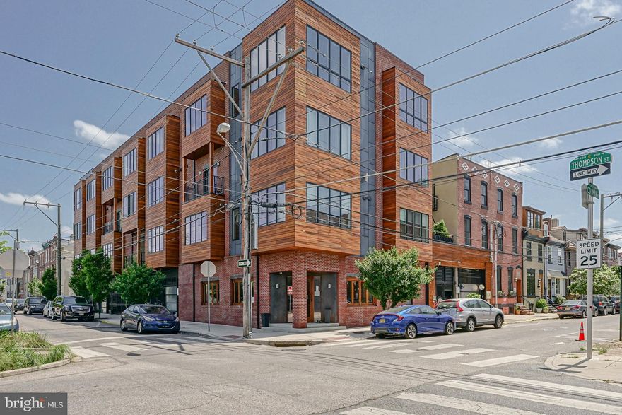 Welcome to the Ice House Condominiums, a LEED Platinum certified building that includes garage parking located in the heart of Fishtown. Renowned for its ultra energy efficient build, enormous communal roof deck and outdoor grilling area, don’t miss the additional rooftop dog park and insane skyline views. This spacious 1 bed, 1 bath condo is not your average home. Enter through the custom glass door and notice the beautiful hardwood floors leading straight into the open living room and kitchen . GE Profile stainless steel appliances, quartz countertops with comfortable seating for 3 at the breakfast bar, plentiful cabinet storage and a custom subway tile backsplash are just some of the features of this chef’s kitchen. An oversized front window provides plenty of natural light into the extra spacious living/dining area. The bedroom features a large closet, ceiling fan and is generously sized. The full bathroom features custom tiling in the shower and an extra large vanity. This home features multiple, common outdoor spaces including a koi pond, a rooftop dog park and a separate grilling/entertaining/lounging area. Walking distance to the numerous cafes, restaurants and nightlife that Fishtown offers, this home is truly a one of a kind residence.