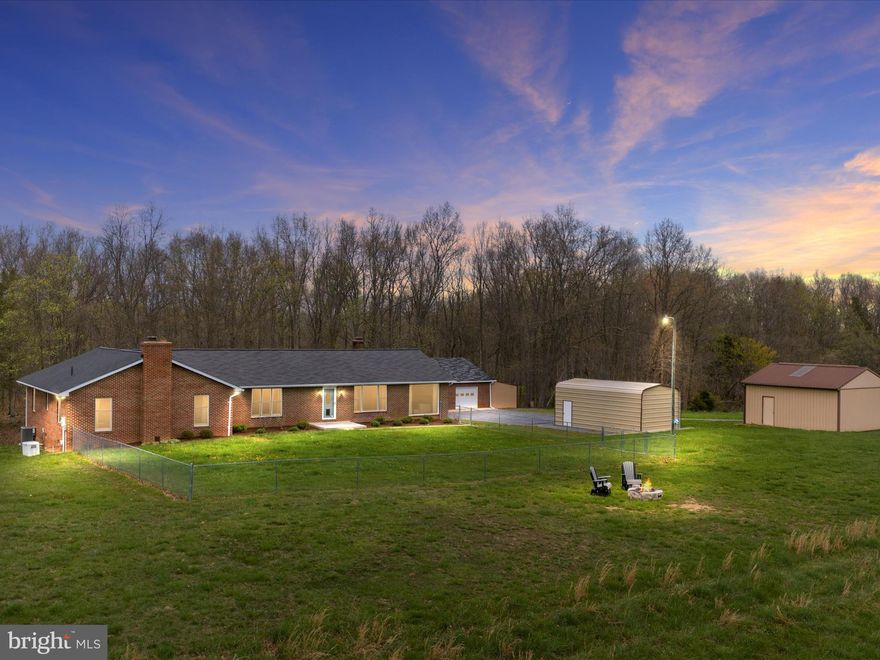 Welcome home to this beautifully maintained, brick rancher in Maurertown, VA sitting on over 27 acres! Boasting 4 bedrooms, 3 and a half baths, creek frontage, a whole-house generator, and a variety of additional amenities, this residence offers a blend of comfort and convenience. With over 3800 square feet of living space, every corner offers warmth and charm.  Indulge in the luxury of a 2-car oversized, detached garage equipped with electricity, LED lighting, and an attached lean-to, complemented by an additional 1-car detached garage and a Conestoga outbuilding. The expansive primary bedroom presents a cozy sitting area, a wood fireplace, a walk-in closet, and an ensuite for your personal convenience.  Exposed wood beams with vaulted ceilings add character and charm to this distinguished rancher.  Downstairs, discover versatile living arrangements, ideal for an in-law suite complete with its own bedroom, bathroom, full kitchen and dining area, or utilize it as a rental space for supplemental income, complete with a separate entrance. There are great outdoor living spaces for entertaining such as a spacious deck and patio. Electric updated in 2024, new roof in 2022, HVAC replaced in 2020 and there is a fenced-in yard and convenient doggie doors to cater to your furry companions, ensuring their comfort and security.  Live in the country but close enough to everything else. Conveniently located minutes from the interstate and restaurants, grocery stores, gas stations, etc.  Bring the horses or any other animals, there's plenty of room!  NO HOA! Come check it out!