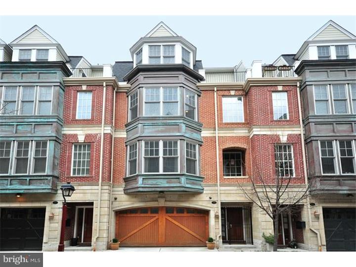 Stunning and very well maintained townehome in Society Hill located on a quiet street with a two car garage! This is a three level townehome with gorgeous hardwood floors thru out, a custom gourmet kitchen and updated luxury master bath. There is a patio for grilling with a small garden and an upper deck offering views of the city lights! This home features Viking appliances, custom surround sound system on all levels, wine cellar, wet bar, large bright rooms with high ceilings. Close proximity to interstate 95,76 expressway,walk to shoppes.