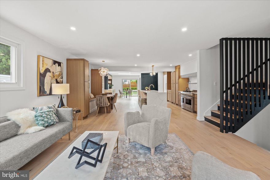 **Sellers request that offers, if any, be submitted by 4 PM on Monday, June 10** Welcome to 9911 Holmhurst Road an expertly reimagined five bedroom , three-full and one-half bath home by the amazing team at Monarch Prime. Stepping into the home feels like you've been transported to the pages of a magazine as you're immediately greeted by spacious and thoughtful living areas with luxury design choices throughout.

 A convenient mud area is located just inside the home and adjacent to  a light-filled and generously sized main living room. Just beyond is an incredible kitchen where no detail was overlooked. An oversized quartz island is both functional and an entertainer's dream boasting ample space for multiple diners and food prep, dual dishwashers and a deep sink. Just behind is the equally efficient and stunning kitchen. A custom built Zephyr hood features under cabinet lighting that highlights a gigantic Jennair range. Surrounded by custom built rift white oak cabinets that include a hidden appliance cabinet with outlets and an integrated cabinet depth Jennair fridge, the kitchen is a showstopper. To complete the dining options, a custom banquet has been added and is flanked by dual pantries for storage. Not to be overlooked, a custom wet bar featuring a water drop water filter and beautiful sconces is just beyond the kitchen and leads to the home's spacious deck and large, flat backyard. Rounding out the main level are the addition of a powder room complete with wallpaper ceiling, a hidden door pantry, and a hidden laundry room with utility sink and custom cabinets with quartz countertops. 

Just a few steps down from the main level is the home's impeccable primary suite with multiple sky lights and french door access to the back yard. Spacious enough for a king sized bed and additional sitting area, it is only overshadowed by the walk-in closet of your dreams. Made from reclaimed shelves and accentuated by a vintage standing mirror, the closet will be the envy of all. A spa like ensuite bathroom boasts dual vanities, custom mirrors, a water closet and a large shower. 

On the home's upper level, three generously sized bedrooms await. Each room has appropriately sized closets and tons of natural light. An updated full bathroom with dual vanities, a tub and built-in towel hooks rounds out this area. 

Just off the main living room is the home's secondary living area that makes for a bonus family room or a perfect in-law suite with separate exterior entrance. The main room features custom built in cabinets and dual exposure windows. Just off is a kitchenette boasting GE Monagram fridge and quartz countertops. The homes third full bathroom is located adjacent. A few steps down is the homes fifth full bedroom with dug out egress. A large utility room with bonus storage space rounds out this level. 

Located just minutes from the Georgetown shopping center and and a short drive to downtown Bethesda, this home is convenient to all shopping, dining and recreational needs. With 495 and 270 access just a few minutes away, it is also perfect for commuters. Ashburton Elementary, North Bethesda Middle and Walter Johnson High School.

Open Saturday June 8 and Sunday June 9 from 12 - 2 PM. Do not miss your opportunity to view this one of a kind home.