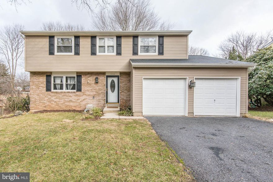 A contract has been accepted by the corporation and awaiting signed copy to revise status. Freshly painted & ready for move-in. 4 bedroom colonial.Finished lower level, large deck overlooking big rear yard backing to parkland. Kitchen with recently refinished hardwood floor adjoins family room.  Large garage that accommodates two cars & storage.