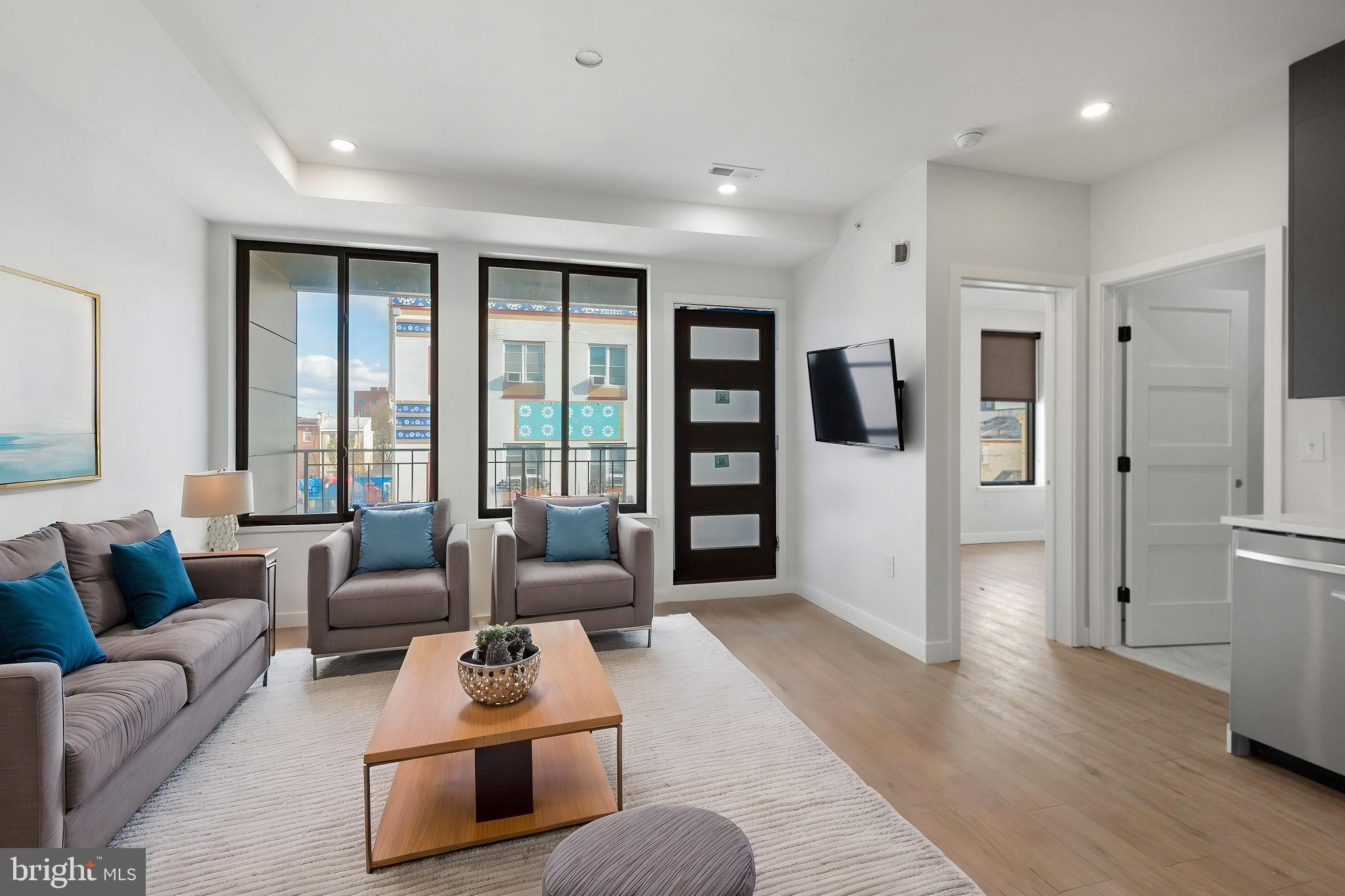 Available NOW | Leasing Special: 1 Month FREE on 13 month lease - $1,431/month net effective rent, $1,550/month gross rent. Only 1st month's rent and security deposit due upfront prior to move-in!
Discover modern living at 1500 Germantown Ave #3A! This stunning 1-bedroom, 1-bathroom top floor unit features secure key fob access, a dedicated mail room, and high-end finishes for a polished look. Inside, the unit boasts warm wood flooring and recessed lighting for a bright and airy atmosphere. Enjoy a small balcony off the living room. The galley kitchen is outfitted with brand-new premium stainless steel appliances, including a dishwasher and electric range - perfect for daily cooking needs. Central A/C provides comfort and a washer and dryer are conveniently included in-unit. The bathroom showcases a contemporary design with a sleek vanity, an illuminated mirror, and a glass walk-in shower. Both bedrooms are well-lit with natural light and offer ample closet space for organization. This unit is perfect for those seeking a blend of comfort and sophisticated design in a modern home. Take advantage of a shared roof deck with stunning views of Center City - schedule your tour today! Please note: some photos may be of a similar unit within the building; exact finishes & layouts may vary.
Lease Terms:
Generally, 1st month, 12th month, and 1 month security deposit due at, or prior to, lease signing. Other terms may be required by Landlord. $55 application fee per applicant. Strictly, no pets. Tenants responsible for: electricity, cable/internet, and a $35/month flat water fee. Landlord Requirements: Applicants to make 3x the monthly rent in verifiable net income, credit history to be considered (i.e. no active collections), no evictions within the past 4 years, and must have a verifiable rental history with on-time rental payments. Exceptions to this criteria may exist under the law and will be considered.