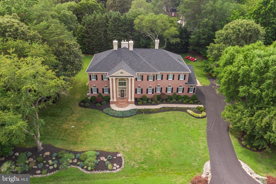 See the 3 D tour here https://my.matterport.com/show/?m=WEG748UoKqp&brand=0 Updated and Opulent! As Harlequin s largest home with over 8,000 square feet, #524 is incomparable inside and out. This regal house stands with 2 story fluted columns flanking the stained glass front door and is topped with a new roof. The professionally landscaped exterior includes an over-sized, multi-level deck with a built-in hot tub and plenty of room for outdoor entertainment . Ornate features abound inside with crown molding, wainscoting, custom plantation shutters and 9 ft plus ceilings in nearly every room. You are welcomed into a grand foyer with a curved staircase that shows off the 2 story ceiling height and opens to both the office and formal dining room. The formal dining room dazzles with a crystal chandelier and sconces. The kitchen is a chef s dream with a large island anchoring the U-shaped design featuring double wall ovens, gas range and built-in microwave, wine rack and office space.  Two pantries and a mudroom with two closets and an extra refrigerator provide ample storage solutions. Also within the kitchen is a large dining area that opens to a light-filled sun-room, all with access to the over-sized back deck. The sunken living room with a 2 story fireplace sits in the heart of the home.  Rounding out the main floor is a completely updated powder room and junior master suite with a bay window, walk-in closet and double sinked attached bathroom. Upon reaching the second level you are graced with balcony views of the foyer and living room below.  The master suite is the piece de resistance of the home with a total of 1450 square feet, two sitting areas, a gas fireplace, balcony, built-ins and a kitchenette.  The master bathroom has a total of 4 walk-in closets, one for each season!  Off the master is a huge laundry room with plenty of counter space and loads of cabinetry.  The second floor also includes 2 additional large bedrooms and a jack and Jill bathroom.  The completely finished lower level provides endless possibilities with its four rooms, currently set up as a Media Room, Recreation/Game Room, Bedroom and Office.  There is also a new full bathroom, access to the exterior and lots of storage areas. Brand new features abound - paint, light fixtures, hardware, tile, etc etc etc.  Incredible price per square foot!  Look for the Special features and brochure in the document section