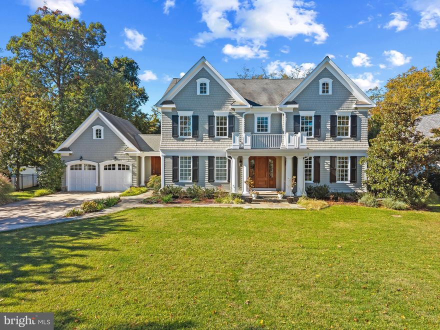 Located in the coveted Wardour community, this stately home combines timeless architecture with an enviable walkable location near West Annapolis’ shops and restaurants and just minutes from downtown. With stunning curb appeal, spacious 0.55 acre lot, expansive front yard and water views from nearly every room in the home, this property offers a rare combination of privacy and community, where every day feels like a retreat yet conveniences are just minutes away.

The main level welcomes with a gracious foyer flanked by formal living and dining rooms, highlighted by custom millwork, crown molding, wainscoting, and hardwood floors. The formal living room features a classic gas fireplace, while the private office with built-ins and the inviting family room with a coffered ceiling provide versatile spaces for work and relaxation. The gourmet kitchen impresses with high-end appliances, a large center island, casual dining area overlooking the backyard, and wet bar adjoining the dining room. A well-designed mudroom off the two-car garage and side entry enhances everyday function.

Upstairs, three spacious ensuite bedrooms complement the luxurious primary suite, which offers a serene sitting room with gas fireplace, private balcony, and spa-like bath. The top floor is a flexible open space with full bath, perfect as an office, playroom, studio, or lounge.

The lower level is an entertainer’s retreat with a full bar, open gathering space anchored by a wood-burning fireplace, and a room prepped to become a wine cellar. A full bath and additional bedroom complete this versatile level.

Conveniently located to access Downtown Annapolis, head over the Bay Bridge to the Eastern shore or jump on Rt. 50 to get back to Washington, DC and just a few short blocks to West Annapolis' charming commercial district's restaurants & shops.  Welcome Home!