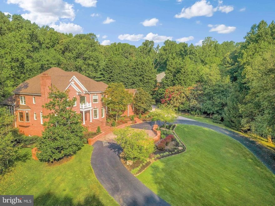 STUNNING HOME BACKS TO THE GOLF COURSE YET MAINTAINS PRIVACY--QUALITY CONSTRUCTION--MANY UPGRADES--OVERSIZED BRICK EXTERIOR ON ALL SIDES--SUN FILLED SOLARIUM--DOUBLE SIDED FIREPLACES--RECENTLY RENOVATED MASTER BATH--CHEF'S KITCHEN--CUSTOM WOODWORK-- WALKOUT BASEMENT WITH CUSTOM MAHOGANY BAR, WORKOUT ROOM, SAUNA, BILLIARDS ROOM--GLAMOROUS HOME THEATER-- COMMUNITY POOLS, SPORTS COURTS, PLAYGROUNDS