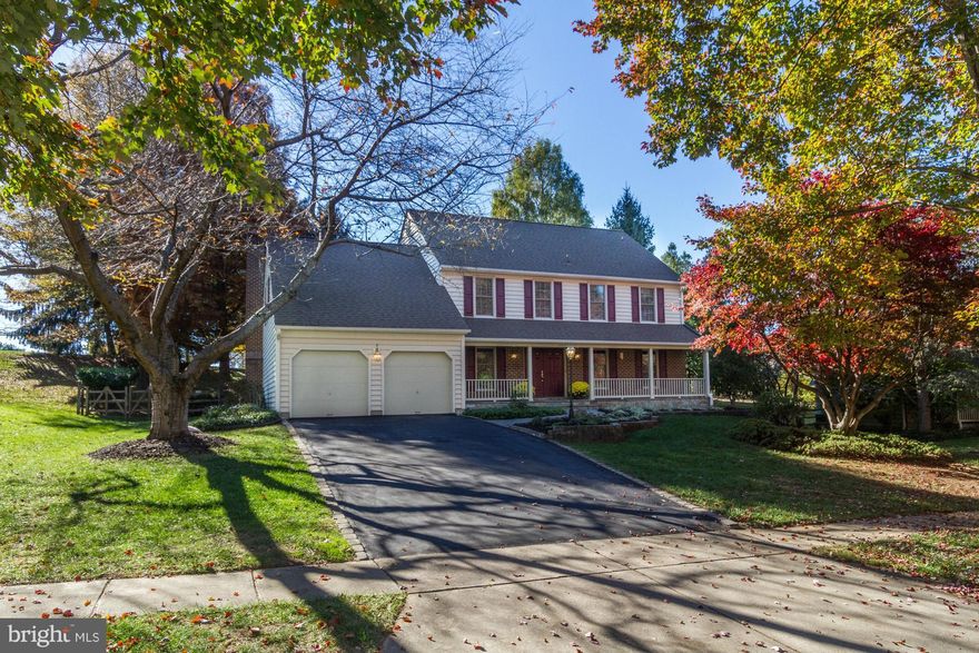 A STUNNING PORCH FRONT COLONIAL TASTEFULLY RENOVATED THROUGHOUT. NESTLED ON A LARGE LANDSCAPED LOT WITH SLATE PATIO THAT ADJOINS THE SUNROOM ADDITION. NEW FLOORING, REMODELED KITCHEN, RENOVATED BATHS, FINISHED BASEMENT. 4 BEDROOMS, 3 1/2 BATHS LOCATED IN THE HEART OF NORTH POTOMAC. THIS LARGE & IMMACULATE HOME IS A MUST SEE. OPEN SUNDAY 12-3