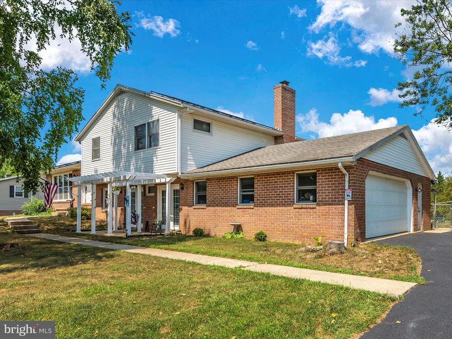 This Beautiful Spacious Home is Situated on almost an acre. 5 Bedrooms 3 Baths, Master Bathroom and Hallway Bathroom Have Heated Floors. Hardwood Floors Throughout Main Level. Updated Kitchen. Spacious Lower Level Family Room. Newly Installed Fence. Solar Panels. Outdoor Patio Great For Entertaining!