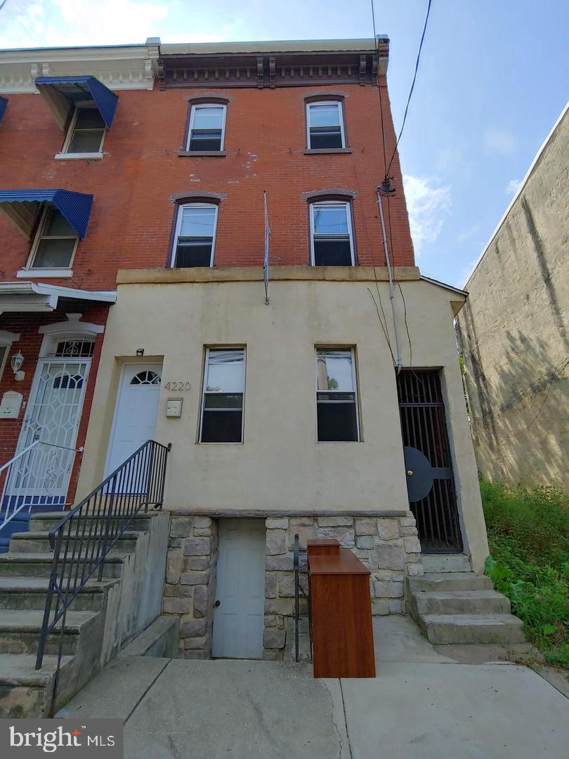Incredible turn-key investment property! 4220 Powelton Ave, a well maintained house, is fully occupied until the end of August 2026. This cash flowing property is in a prime Drexel University off campus student housing location! The property boasts a well established record of Tenant payment history. Current rent: $2500/month, tenants pay all utilities, $2600/month starting in September 2025. Many of this home's amazing features include: 4beds/2 large baths, separate living room, dining room and kitchen spaces. HUGE backyard with lots of patio and garden space (could be used as a double lot, may be able to subdivide.). There is also a gated side walkway. Located directly across the street from Drexel's Practice Fields makes 4220 Powelton Ave very popular with students. The walkout basement with headspace is perfect for storage or other uses. Within walking distance to Drexel University and all the dining and entertainment the area has to offer, this property is perfect to add to your portfolio. Schedule your appointment today!
