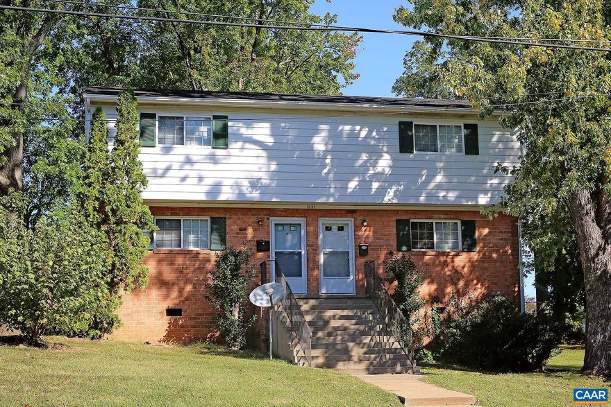 This city duplex is ideal for immediate occupancy! The 3 bedroom, 1.5 bath home is located on a corner lot adjacent to Forest Hills Park. The park offers a seasonal splash pad, playground, basketball court, picnic shelter, green space, and walking trails, ensuring ample space for outdoor activities. It's also conveniently located near the UVA Medical Center, shops, and restaurants along West Main Street, as well as the Amtrak Station, the downtown mall, the IX Park, and the Dairy Market.  The 1,080 sqft rental offers a freshly painted interior, a full-size washer and dryer, a grassy backyard, and off-street parking. The main level includes a carpeted living room, a spacious and sunny kitchen with a brand-new refrigerator, plus a half bath. The top level includes three carpeted bedrooms which share an updated hallway bathroom.  The rent includes lawn care. One off-street parking spot is included. Occupancy is restricted to a maximum of three unrelated individuals. No undergrads.