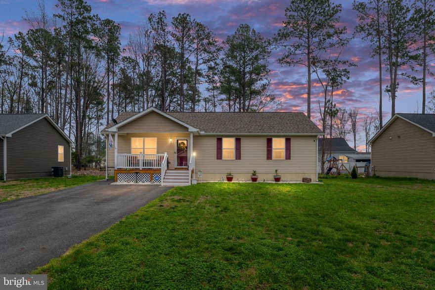 Welcome to 78 Rustic Lane in the desirable Berkley Beach community of Colonial Beach—where easy, one-level living meets the charm of a water-access lifestyle!



This beautifully maintained 3-bedroom, 2 full bath home offers 1,344 square feet of thoughtfully designed living space, featuring the popular Caroline Plan all on one level. The open-concept layout creates a seamless flow between the living, dining, and kitchen areas—perfect for both everyday living and entertaining.



The kitchen shines with granite countertops, brand new stainless steel appliances, and ample cabinetry, all complemented by durable and stylish LVP flooring that runs throughout the entire home. Step outside and enjoy your morning coffee on the inviting front porch or unwind on the freshly stained rear sun deck overlooking a spacious backyard—ideal for gatherings, pets, or simply soaking in the peaceful surroundings.



Located in a water-access community, you’ll love the lifestyle Berkley Beach offers, with nearby access to the Potomac River and all the charm that Colonial Beach is known for—local restaurants, boutique shopping, golf cart-friendly streets, and year-round festivals that bring the community to life.



An added bonus: this home is just outside the town limits, allowing you to enjoy all the perks of the area without paying both town and county taxes—a rare and valuable advantage!



This home is truly a standout—beautifully decorated, meticulously cared for, and move-in ready. A perfect blend of comfort, convenience, and coastal charm—don’t miss your chance to make it yours!