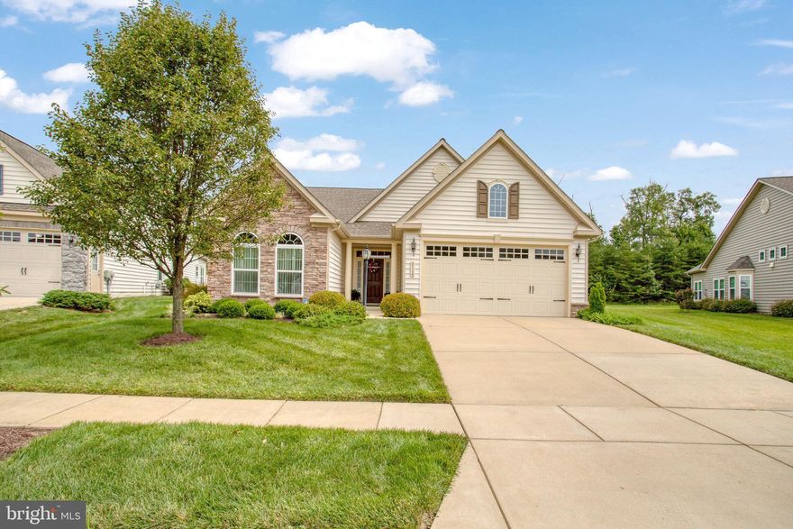 Ready to be impressed? 55+ Active Adult community with amenities, pool, and clubhouse.  Amazing one level w/ 2 car garage.   Two BRs (plus Den/Library) & two full Baths including an expanded, Primary BR w/tray ceiling, soaker tub removed to create a roomier shower, walk in closet. 2nd BR also expanded when built. Custom shades & blinds.  Chef's Delight Kitchen.  Island. SS Appliances. Cooktop & Double Ovens .  Great Room w/gas FP. Security System. In ground irrigation system.  Wonderful screened porch for relaxing and entertaining.  New roof 2017, HWH 2020.  All FFBCs paid in full 2016.  This beauty backs to trees and is very private.  the lot  fans out in the back creating a wide side yard.  Shows better than a model home PLUS lawn service incl in HOA fee! You won't have to lift a finger...inside or outside!