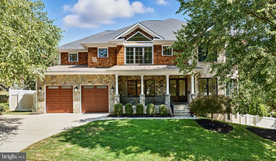 Built in 2015 and meticulously maintained, this home lives like new construction - without the growing pains! Experience the perfect blend of elegance, modern design, and functional luxury in this 6-bedroom Contemporary Craftsman, perfectly situated on a beautifully landscaped ¼+-acre lot in McLean’s highly sought-after Birchwood neighborhood. 
Step onto a private, elevated front porch and enter a spacious foyer flanked by formal living and dining rooms with graceful wainscotting. The gourmet eat-in kitchen is a chef’s dream with Thermador & Bosch appliances, a 6-burner + griddle range, marble countertops, and a large breakfast bar with prep sink. French doors open to a tranquil flagstone patio, ideal for al fresco dining. The kitchen flows seamlessly to a coffered-ceiling family room with gas fireplace, while a tucked-away main-level bedroom doubles as a private office or guest suite. Functionality meets style with two staircases, two powder rooms, and the ultimate mudroom drop zone featuring ample cubbies, walk-in pantry, and additional storage.
Upstairs, the primary suite impresses with a tray ceiling, private sitting room with gas fireplace and wet bar, two walk-in closets, and a spa-like bath with dual-sink marble vanity, soaking tub, and oversized double shower. Three ensuite bedrooms, each with walk-in closets, along with upper-level laundry and two linen closets, complete the level.
The fully finished walk-out lower level offers a 6th ensuite bedroom, kitchenette and bar area, expansive rec room with gas fireplace, theater room, and bonus space ideal for a home gym. With soaring ceilings, oversized windows, mature landscaping, irrigation system, and fully fenced backyard, 6434 Noble blends modern convenience with refined luxury for effortless living and entertaining.
