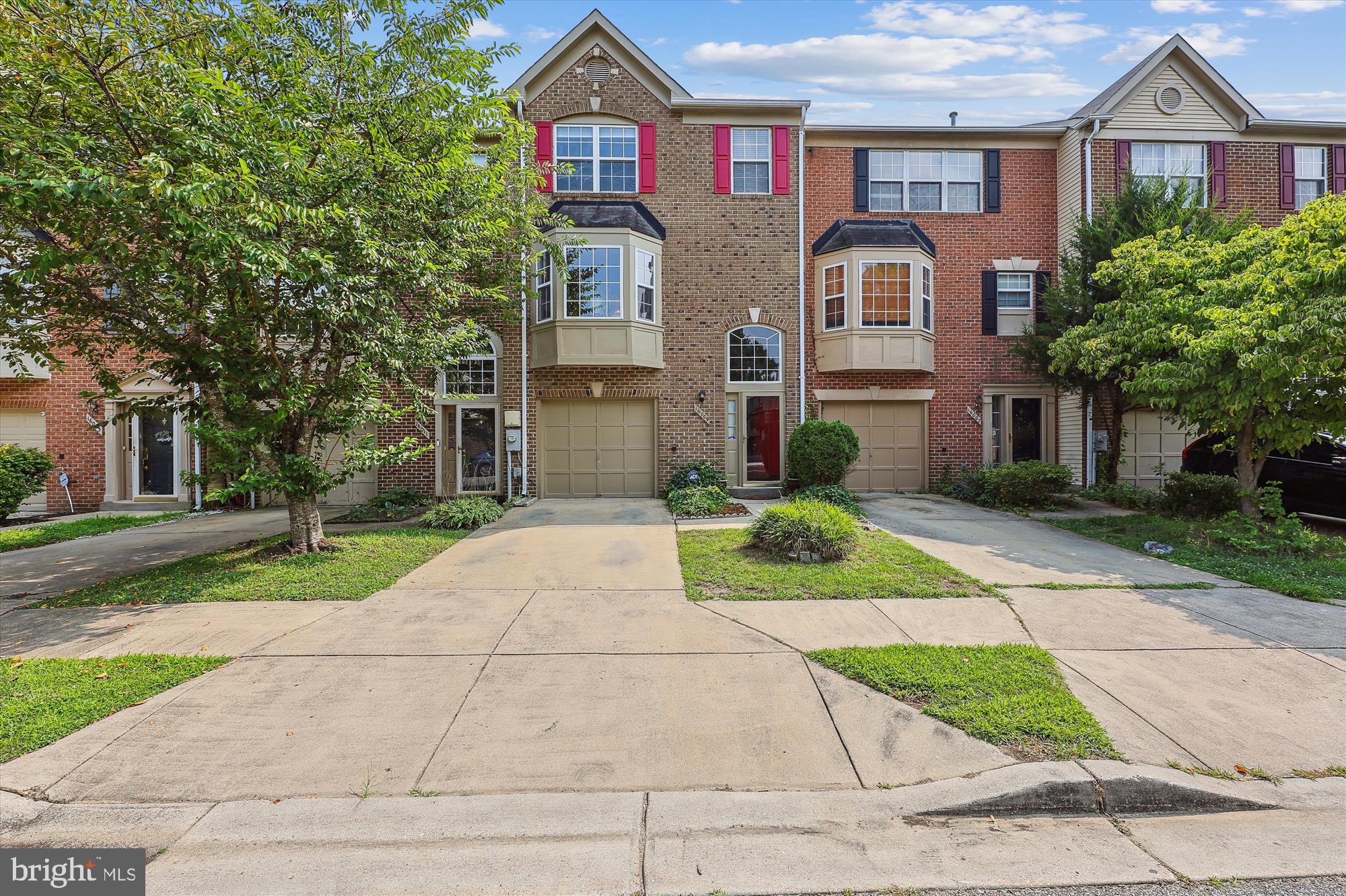 Location, Convenience, Lifestyle! Welcome Home To Your New 3 Bedroom 4 Bath Townhome With Garage In The Sought After Palisades Neighborhood Of Bowie. Freshly Painted Throughout, New SS Appliances, New Carpet in Bedrooms & Lower Level Rec Room, Hardwood Floors On The Main Level & Stairs, Ceramic Tiled Front Foyer & Kitchen. Entertain in Open Concept Main Level Living/Dining Area Leading To Eat In Kitchen & Large Deck. Relax & Rest In Upstairs Primary Bedroom With Vaulted Ceiling & Attached Private Primary Bath. Spacious 2nd & 3rd Bedrooms, & Additional Full Bath. Enjoy the Lower Level Rec Room With Powder Room & Sliding Door Leading to Second Deck In Fenced Backyard With Gate Leading To Tot Lot. Close to Shopping, Parks & Recreation, Major Commuter Routes 50, 301, 197, MARC Commuter Train, & Much More! Must See Today!