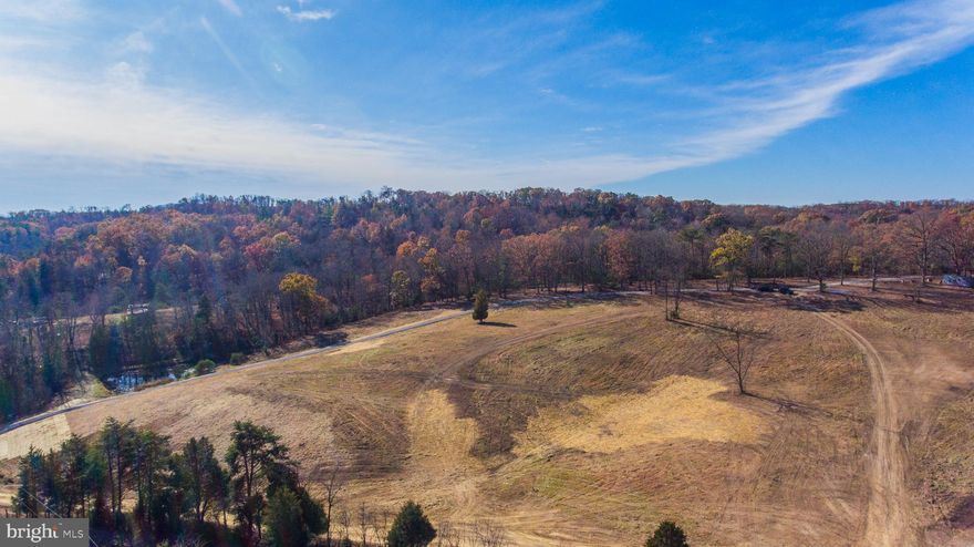 DON'T MISS THIS ONE! Here is your opportunity to build your dream home with STUNNING  year-around views.  Country living but convenient to town    You want privacy, here it is with no restrictions or HOA.  Owner has improved property and has put in a  driveway that could lead to your homestead. There are 2 established perc sites (3 bedroom, 4 bedroom) giving you the options where to build or create your own perc site. Divide the property and build multiple homes.  Bring your livestock, 4 wheelers or just enjoy the wildlife.   The choices are endless.  Call for more information. Plat available.