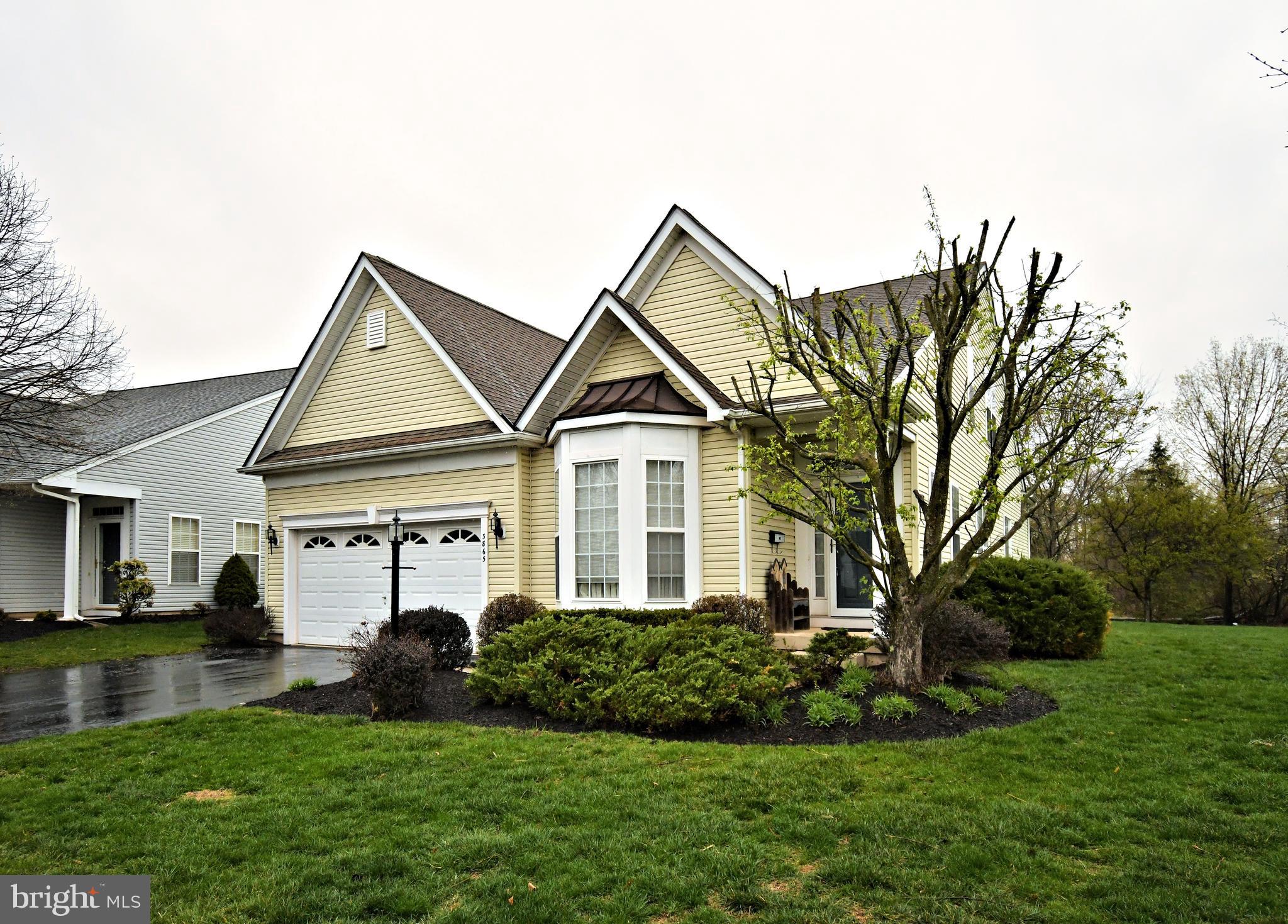 Offered for sale for the first time and with the best lot in the neighborhood in the sought after Traditions At Skippack, I proudly present 3865 Somerset Dr. This home boasts nice hardwood flooring throughout most of the first floor and brand new carpet and padding throughout the rest of the home. It is one of few homes in the neighborhood that offers a full unfinished basement for extra storage and workshop space. The dining room consists of a beautiful chandelier, chair rail, crown molding and on the opposite side of the room is a lovely living room. The eat-in kitchen with large kitchen island big enough for 3 bar stools boasts Quartz counters throughout the kitchen. The kitchen also has all stainless steel appliances, brand new dishwasher, double sink, 42" cabinets, 2 pantries, and ceramic tile flooring. Just off the kitchen is a spacious family room with gas fireplace, ceiling fan and 2 sliding glass doors that brings in a lot of natural sunlight. The large first floor master suite with Trey ceiling and a walk-in closet offers more natural sunlight to brighten up the room. There is a master bath with double sinks, soaking tub, and a large shower with sit down bench. The first floor also boasts a separate laundry room with utility sink, powder room, and a separate bar area when entertaining guests. Upstairs are two nice sized bedrooms with large closets, a full hall bathroom, an open sitting area, and a walk-in unfinished storage area that could be easily finished. The back yard is a very private space offering a large Trex deck (20'x16') in size and a retractable awning for the real bright sunny days. This community offers outdoor pool, club house, fitness center, tennis & racquet ball courts, walking trail, and billiard room. Close proximity to Skippack shopping district and lots of great restaurants. Hurry! Schedule your showing today before it's too late! Professional photos will be uploaded soon!