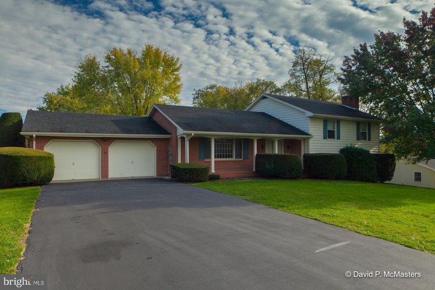 Spacious, nicely finished, attractive 4 BR split level home on very quiet street in established, stable subdivision. Excellent location close to all transportation. Separate dining room, big  basement, built-ins, large family room w/ fireplace, 2 car garage. Nice yard with plantings. Covered porch. HVAC new 2017. Low maintenance. No through Street.  A nice comfy, quiet place to call your own.