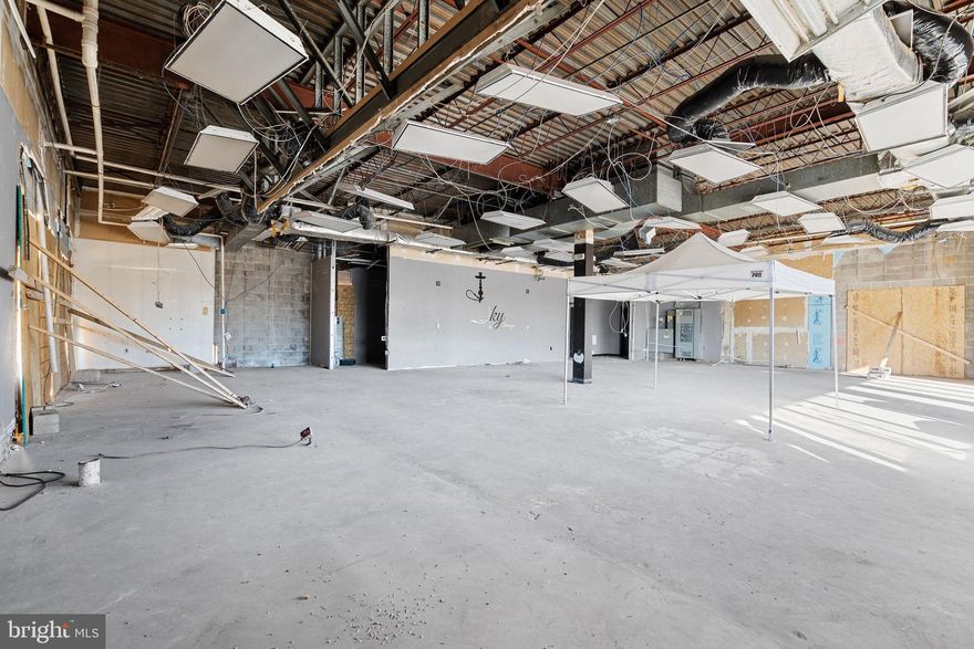 Beautiful Bones! Investors the possibilities are endless. Large parking lot and so much land! 3000sq ft blank canvas.