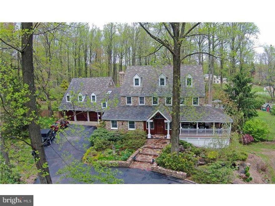 Your own Shangri-La! Nestled on two beautiful acres at the end of a cul de sac, this home offers privacy and convenience.The home is Howard Okie designed, has been meticulously maintained complete with koi ponds, a gorgeous swimming pool/jacuzzi for 6, and is a gardener's delight. It has been featured on the Garden Tour hosted by the Pennsylvania Horticultural Society. The main house offers a beautiful marble floored foyer, kitchen and dining rooms. Brazilian  Cherry library with wet bar,  4 additional bedrooms-the main bedroom has three walk in closets, a full bath with Architectural Digest views! walk in shower and gas fireplace. There is a media room with wood burning fireplace, sunroom with all glass walls that is adjacent to the kitchen and provides abundant sunshine. The kitchen has a generous eat- in area, cherry cabinets with granite countertops, and wonderful built in cabinets. The dining area has access to atrium doors that open to a  wrap around porch,the sound of the multiple waterfalls is so peaceful! There is a guest house attached to the main home complete with a bedroom, full bath, living and dining area, kitchen and loft area overlooking manicured grounds complete with a gazebo, walking paths and specimen plantings including  Red Cut Leaf Maples and Weeping Hemlocks.The side and rear property is completely fenced. There is an outdoor grill on the patio with granite countertops and refrigerator.  The home is exterior maintenance free with Lamarite slate roof with 50 yr warranty, cultured stone siding, aluminum trim and dormers, and Trex like decking and balusters.  This property is near Applebrook, and East Goshen Park, and just minutes to all major routes. It is a home that will be cherished by the new owner for many happy years!