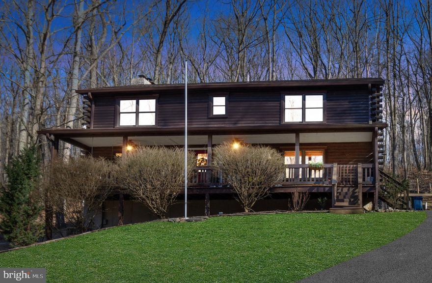 Back on market due to buyers being unable to attain financing!!!! No fault of the home. Welcome to your own private oasis! Nestled on almost 5 acres, this home provides the ultimate blend of comfort, peace, & privacy.  This log cabin in the woods is the best of both worlds- it feels like a retreat as you drive down the tree-lined paved driveway but is also close to all the amenities! The inviting front porch is perfect for sipping morning coffee or an afternoon cocktail while you take in the beautiful nature around you!  As you step inside, the craftsmanship & character will greet you- soaring ceilings, gorgeous floors & so much more. An open floor plan provides functionality for entertaining. The family room has a cozy wood stove that will keep you warm & snuggly all winter long. Kitchen features an island, plenty of cabinets, double oven, lots of counter space & an adjacent laundry room and dining room. Upstairs, you will find a sprawling primary suite with a walk-in closet,  vaulted ceilings and an on-suite bathroom- complete with a soaking tub, dual vanities & separate shower.  Hall bath was just painted, and the toilet & vanity are brand new. Basement has lots of storage and half is fully finished- could even be an in-law suite or extra space with a full bath, another bedroom and living room with a stone fireplace.  Outside, there is plenty of room to entertain- my sellers have made this their own personal homestead, with a beautiful chicken coop (Have you seen the price of eggs!?),  a goat shed, lots of garden beds & plenty of room to explore & play. There is livestock fencing and housing for a myriad of animals if you want to farm or homestead, and the backyard is fully fenced in.  Come take a tour, you will not be disappointed! ************THE SELLERS OWN THE ADJACENT 16 ACRE PARCEL AND WOULD CONSIDER SELLING THAT AS WELL IN THE FUTURE, IF INTERESTED********

PLEASE DO NOT DRIVE BY- SHOW BY APPT ONLY.