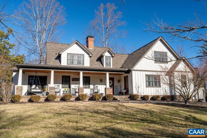 Set on 5 beautifully landscaped acres, this spacious 3-bedroom home offers privacy, character, and exceptional versatility. This home has a timeless look, complemented by a welcoming front porch and an elevated setting on a gentle knoll.  Inside, you?ll find generously sized rooms, two wood-burning fireplaces, recently updates include new decking, appliances, improvement to the driveway, and conditioning the crawl space. The expansive first-floor primary suite provides comfort and convenience, while two large second-level bedrooms share a full bath.  A long, winding driveway leads to the home, enhancing the sense of privacy and retreat. The detached, oversized three-car garage includes a finished apartment above?ideal for guests, extended family, or rental income.  Set well away from the main residence with its own separate driveway is a 2,300 sq ft barn featuring a concrete floor, multiple bays, and electricity?perfect for hobbies or storage. The property extends to Redbud Creek, adding natural beauty and recreational appeal. The current owner has done extensive clearing and tree work to really make this an exceptional place.   A truly unique offering in a fantastic location.,Fireplace in Family Room,Fireplace in Living Room