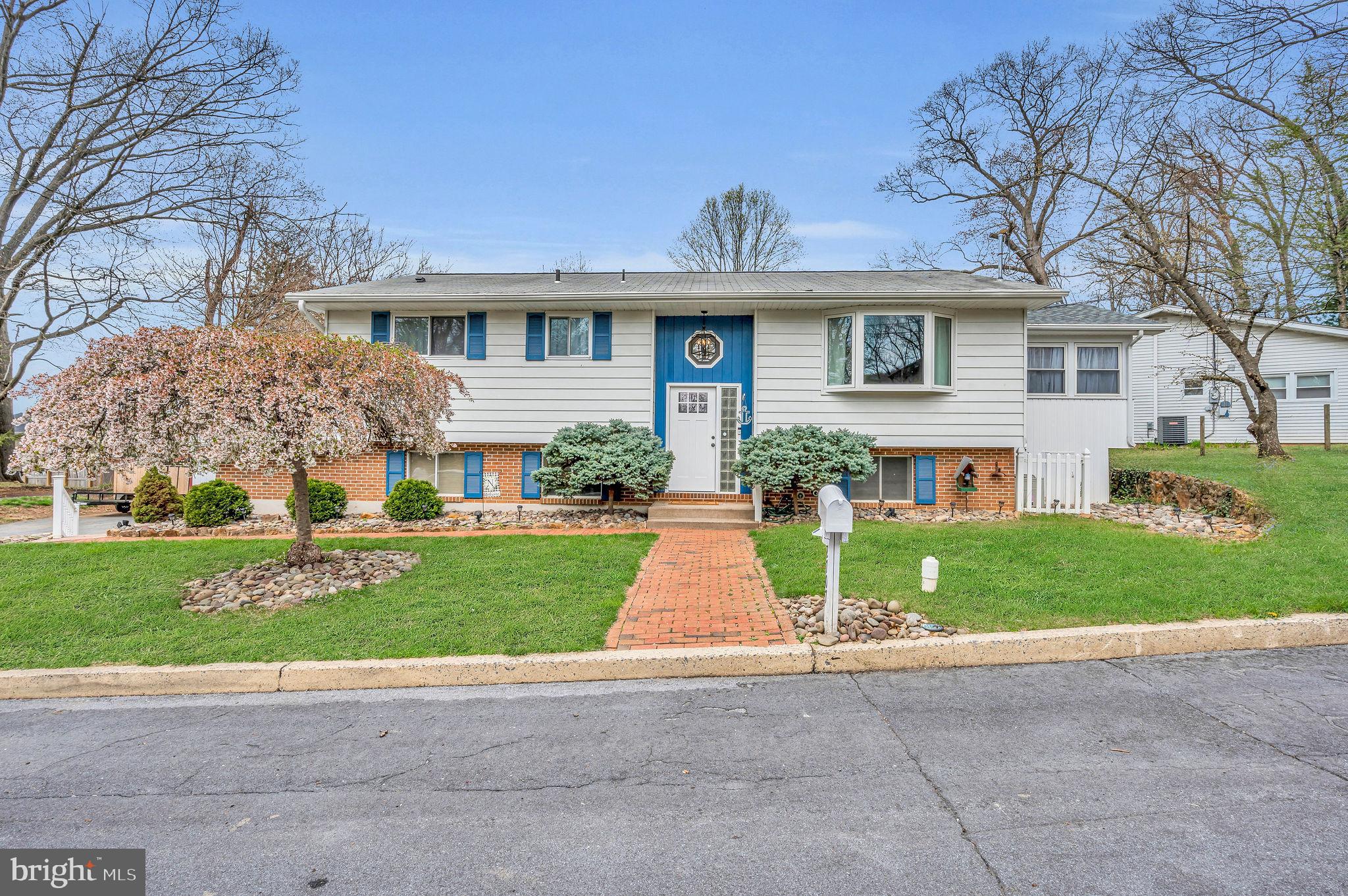 Welcome to this inviting 3 bed 2 bath bi-level. Lower level is fully finished that includeds a recently renovated Laundry and full bathroom. Family room boasts wood burning stove and sliders to the fenced back yard. Upper level features large country kitchen with ample eat in space and large pantry. Sun room off the kitchen offers peaceful retreat for those who enjoy sitting in a reading corner with a book in the sun or a great place for home office. Super convenient location that sits in a private nook of neighborhood and yet minutes to shopping and Routes 78