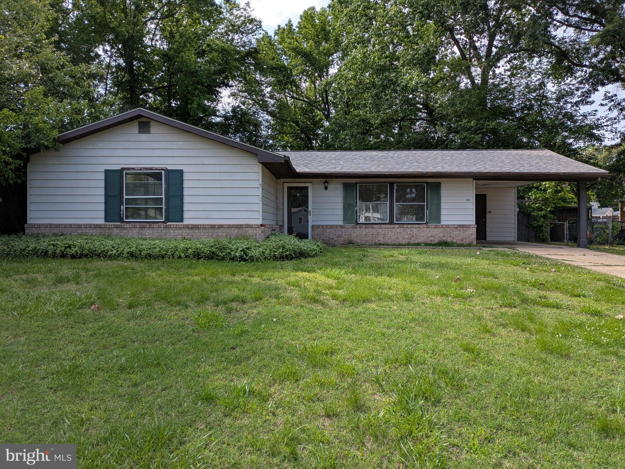 This spacious one-level home offers over 1,700 square feet and sits on a quiet cul-de-sac in the sought-after Carrington neighborhood. With 3 bedrooms, 1.5 bathrooms, an eat-in kitchen, a separate living room, and a spacious family room with a built-in bar, this property also offers a fenced backyard, a shed with electric, a covered carport, and a recent roof replacement. Conveniently located near schools, military bases, shopping, houses of worship, and key commuter routes. Sold AS IS– tons of potential with a little TLC!