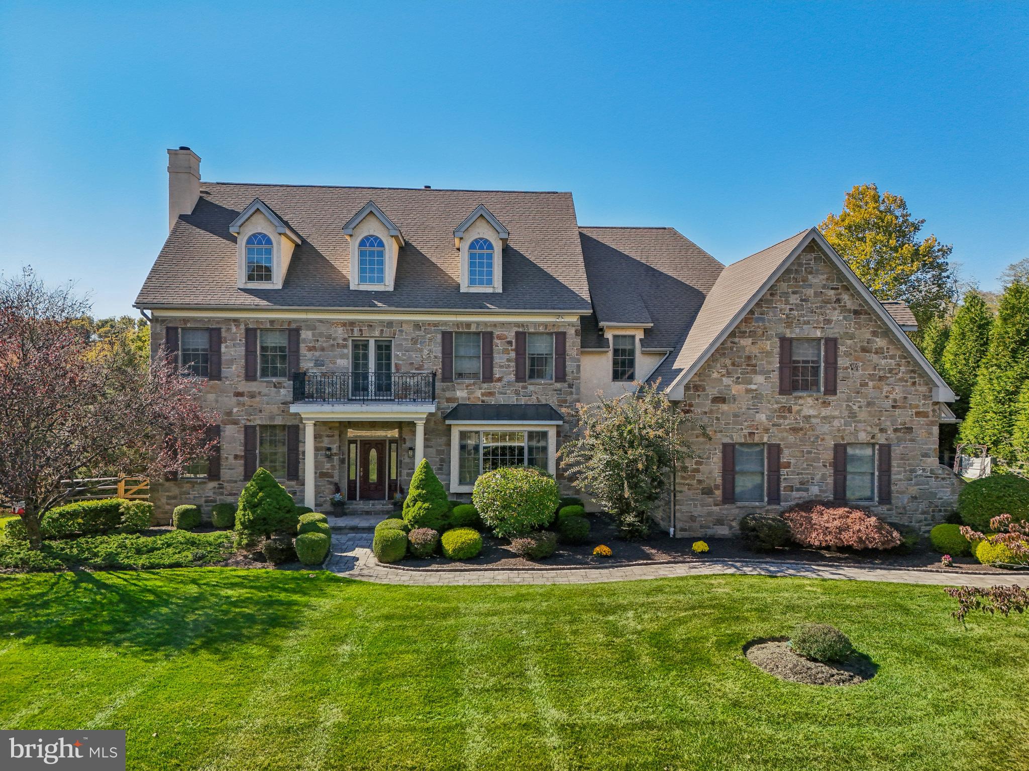 Available for Quick Settlement!
Welcome to this stunning 5-bedroom, 8-bathroom residence located in the highly desirable Parkers Preserve community and the award-winning Unionville-Chadds Ford School District. Situated on a beautifully landscaped 1-acre lot, this elegant home boasts over-the-top amenities, timeless style, and space to entertain both inside and out. With four fireplaces, a walk-up attic, and a three-car garage, this home delivers functionality and refined finishes at every turn.
Enter and feel a sense of grandeur with a picturesque staircase and two story foyer to greet you. To one side find the formal dining room with a tray ceiling and charming wainscotting trim. To the other a classic living room is drenched in natural light and boasts a cozy fireplace. From here find access to the main floor home office with private entrance to a sun room.
Enjoy a gourmet kitchen featuring an expansive island, 6-burner Viking cooktop, built-in SubZero refrigerator, two dishwashers, a butler’s pantry, and a wet bar—all seamlessly flowing into the breakfast room with a vaulted ceiling. The family room boasts a coffered ceiling, fireplace, and custom built ins giving the home a true sense of character. This level is completed by access to the 3 car garage and 2 powder rooms.
Upstairs the primary suite awaits with an airy tray ceiling, formal sitting room with fireplace and impressive ensuite bath. Four additional bedrooms each with their own bathrooms, and large laundry room complete this level ensuring comfort for all.
Not to be missed, the fully finished walkout lower level is designed to impress, offering a two-tier bar, expansive entertainment space with fireplace, media room, game room, exercise area, and a full bath. Step outside to your own private paradise—an entertainer's dream—featuring gorgeous hardscaping and landscaping, a fenced yard, privacy hedge, and a sparkling in-ground pool with hot tub. All this, just minutes from Routes 926, 1, and 52, and the renowned Longwood Gardens.
Don’t miss your opportunity to own this exceptional home—schedule your private tour today!
