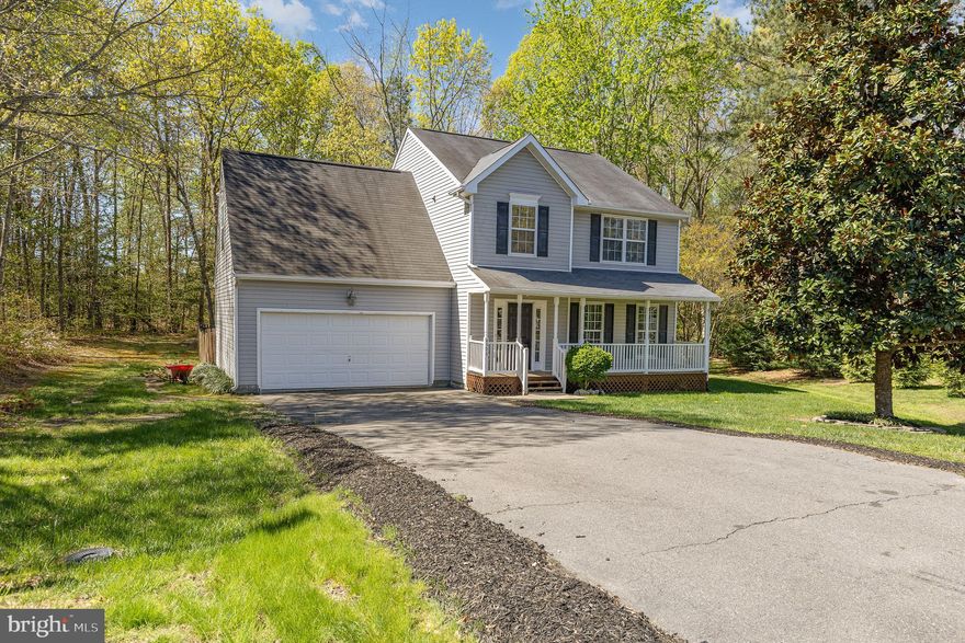 WELCOME HOME...This spacious 4 bedroom, 2.5 bath home is nestled on a generous lot in a peaceful cul-de-sac.  The inviting family room features a cozy fireplace, perfect for relaxing evenings. The kitchen offers a functional layout and opens directly to the fully fenced back yard- ideal for both everyday living and entertaining.  Situated on almost half an acre, there's plenty of room to play, garden or create your dream outdoor retreat.   Conveniently located just minutes from shopping, dining and all of your  daily essentials.  Don't miss this opportunity to own this beautiful home in a prime location.