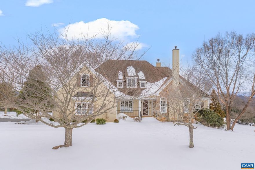 Featuring beautiful views of the Blue Ridge Mountains, this charming home sits on 2 plus acres in the highly sought after Rocks neighborhood. Surrounded by rolling hills and utter tranquility, 500 Rocks Farm Drive not only showcases main level living at its finest, but also provides front row seats to one of the best sunset views in town from its very own private deck and screened porch areas.  With its vaulted ceilings, custom built-ins and wood burning fireplace, the Great Room provides a warm welcome and flows seamlessly to the beautifully updated kitchen with quartz countertops, gas range and stainless steel appliances, well appointed dining room, and cozy breakfast nook. Two spacious primary suites along with a private study complete with its own gas fireplace round out the main level living area. The walkout terrace provides additional living spaces with 2 to 3 additional bedrooms, a full bath, a cedar closet and 1,600 plus square feet of unfinished space for storage or future development.  Additional features include solar panels, backup generator, new Rinnai tankless water heater, new water purification system in kitchen, refinished wood floors throughout and new carpeting on terrace level.,Cherry Cabinets,Quartz Counter,Wood Counter,Fireplace in Home Office,Fireplace in Living Room