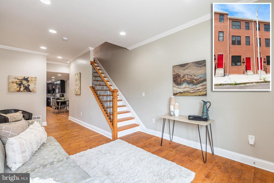 BEAUTIFULLY DESIGNED RENOVATION WITH 3 FINISHED LEVELS & OFF STREET PARKING!  Gleaming hardwood floors and crown molding throughout the main level, spacious living room and separate dining area, designer kitchen w/ granite counters, ss appliances, and tile backsplash, main level half bath, 2nd level w/ 2 large bedrooms and a hall bath, 3rd level Master suite w/ walk-in closet and full bath, unfinished basement that's perfect for storage, and off street parking!  Conveniently located to UMMC, stadiums, and downtown Baltimore!  Pack your bags and move right in!