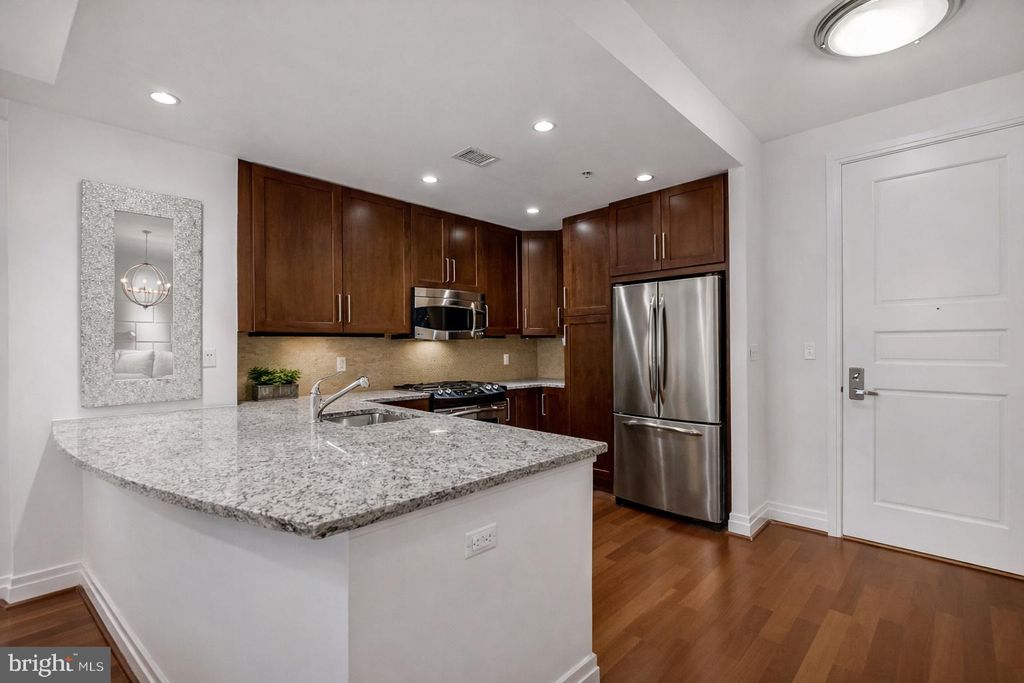 Photo of 8220 Crestwood Heights Drive #314, MCLEAN, VA 22102 (MLS # VAFX2310364)