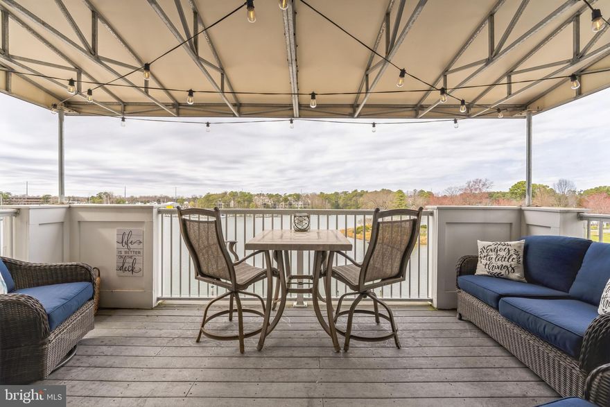 Looking to simplify your living but keep all the vibes of being on vacation?  Look no further….Check out this stunning corner unit penthouse waterfront condo with breathtaking views!  Enjoy your coffee in the morning or watch the ever changing sunsets in the evening on your cozy balcony overlooking Back Creek.  The balcony has an extra storage closet (unique to this building).  This beautiful open floor plan layout features two bedrooms and two full bathrooms with water views from every room!  New paint, flooring, and carpet throughout.  Beautiful Kitchen with granite countertops, brand-new stainless-steel appliances, and a two-level island with bar stools that convey!  Brand new washer and dryer.  Master bedroom features an upgraded bathroom with new tile, a separate shower, and a soaking jetted tub.  New HVAC in 2019.  Oyster Bay community has so much to offer from kayaking, boating, tennis/pickleball courts, gym, clubhouse, and an inground pool.  Also included in a 35’ deeded boat slip so you can hop on your boat and head down to one of the many waterfront restaurants on Solomons Island for dinner!  More added bonuses to this property are covered assigned parking, overflow parking available, a private storage unit, and access via elevator or if you’re feeling up to it, take the stairs to your coastal oasis.  Summer is coming, don’t wait on this one!