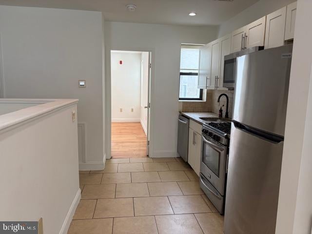 2908 RIDGE AVENUE 3RD FLOOR