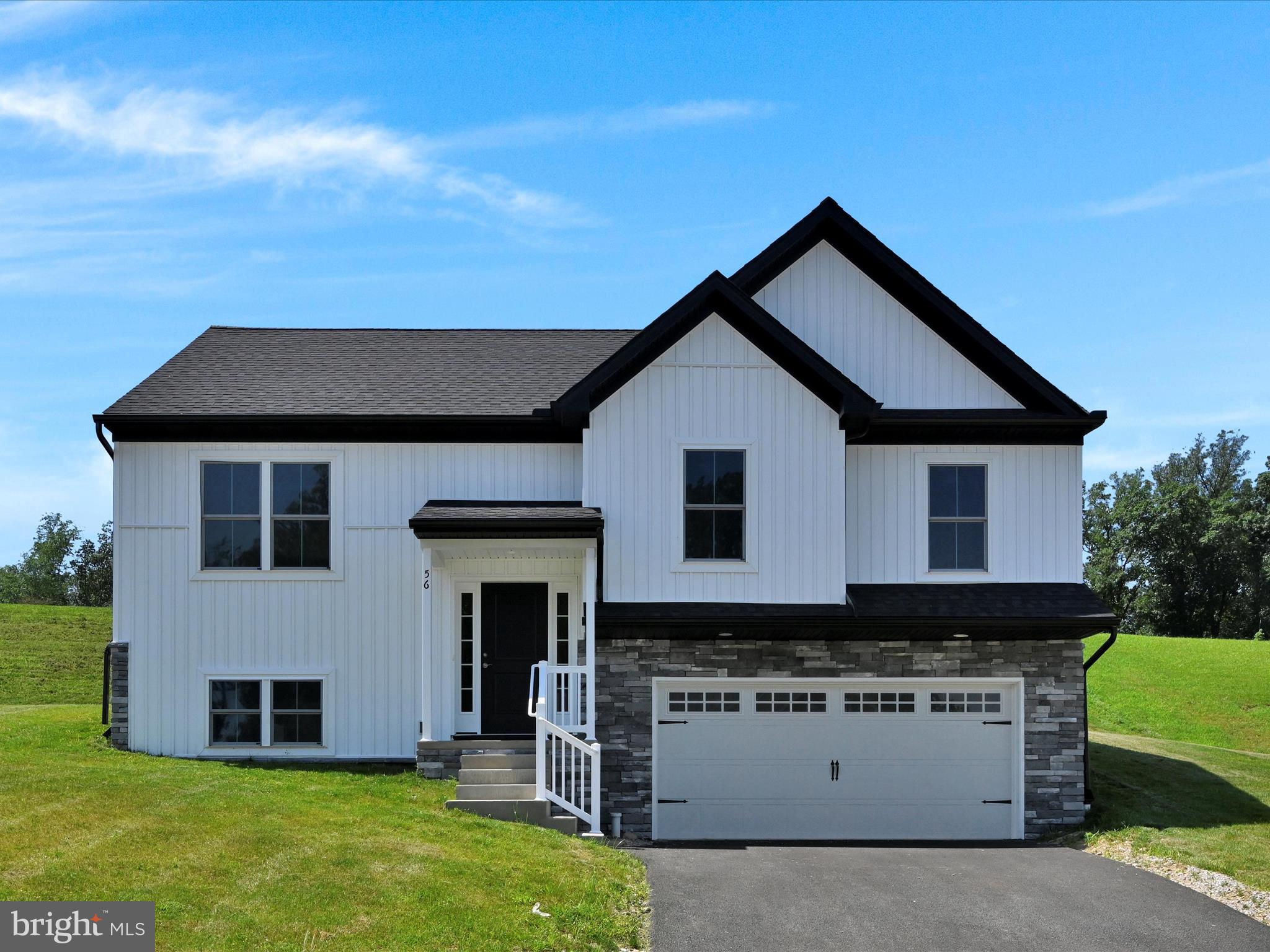 QUICK MOVE IN HOME! Here is your chance to purchase a NEW home in the highly desired community of Spring Forge! This community is located in Spring Grove Boro and is within minutes of schools, restaurants, shopping, and local amenities. The Featherton II model features 3 bedrooms, 3 full bathrooms, 1,740 square feet of total living space, an oversized 2 car garage, and a patio! LVP flooring is included in select areas and in all of the bathrooms! Painted cabinetry, stainless steel appliances, and granite countertops are also included in the kitchen! What are you waiting for?! Schedule your showing today!