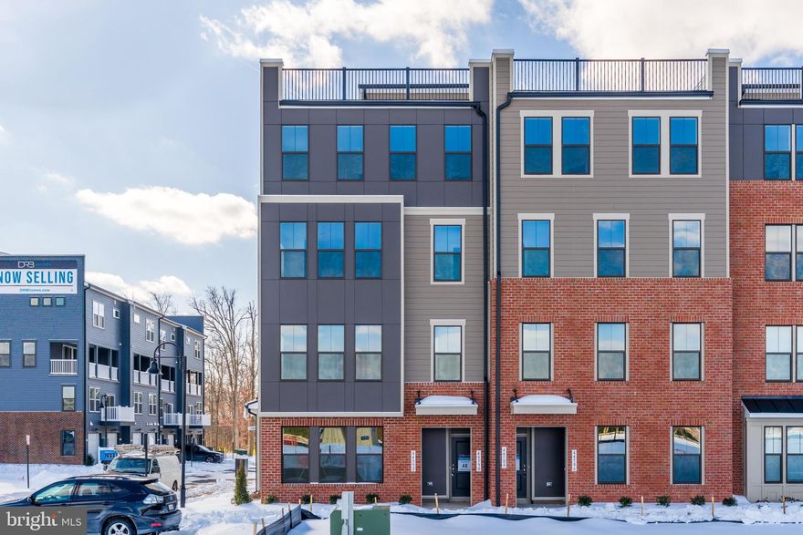 $500 pet deposit and $50/month pet rent. Don’t miss this brand-new townhouse in the highly desirable One Loudoun community. This 3 bed, 2.5 bath new-construction home offers a perfect balance of comfort, privacy, and convenience.

Designed with modern living in mind, the open-concept layout creates a seamless flow between the living, dining, and kitchen areas — ideal for both everyday living and entertaining. The gourmet kitchen serves as the heart of the home, featuring sleek finishes, abundant cabinetry, and generous prep space. The spacious primary suite is a true retreat, complete with a walk-in closet, dual vanities, and a large walk-in shower. Upstairs laundry adds everyday ease, and low-maintenance living allows you to spend more time enjoying your surroundings.

Enjoy the benefits of a private garage featuring an electric car charger, modern construction, and thoughtfully designed spaces throughout. Located in a prime Ashburn location, you’re just moments from One Loudoun’s vibrant mix of shopping, dining, entertainment, and community events, with easy access to major commuter routes — making this home as convenient as it is stylish.