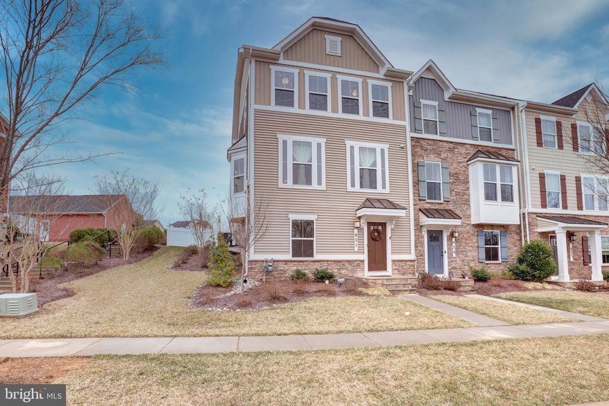 Light, bright and open end unit "Brahms" model townhome with 3-fully finished levels - over 2100+ square feet with 4BR and 3.5FB. Main level features hardwood flooring thought out the open layout with Family Room, Gourmet Kitchen with granite counter tops, island, stainless appliances, and breakfast bar as well as the adjoining Dining Area. Upper level has 3 Bedrooms and 2 Baths including the Primary Owner's Suite with Tray Ceiling, walk in closet and attached luxury bath with jetted soaking tub and separate shower. Convenient Bedroom level laundry! Lower Level has a Rec Room, 4th Bedroom, and Full Bath. Fully fenced rear yard and 2 car detached garage. Home has a whole home surge protector installed. The Brunswick Crossing community amenities are the nicest in Frederick County: pool, soccer field, tennis, rec center, walking trails, tot lots and more! Adjoins the Weis shopping center and is right off Rt 340 minutes to the MARC train station. This is a great townhome in fabulous neighborhood!